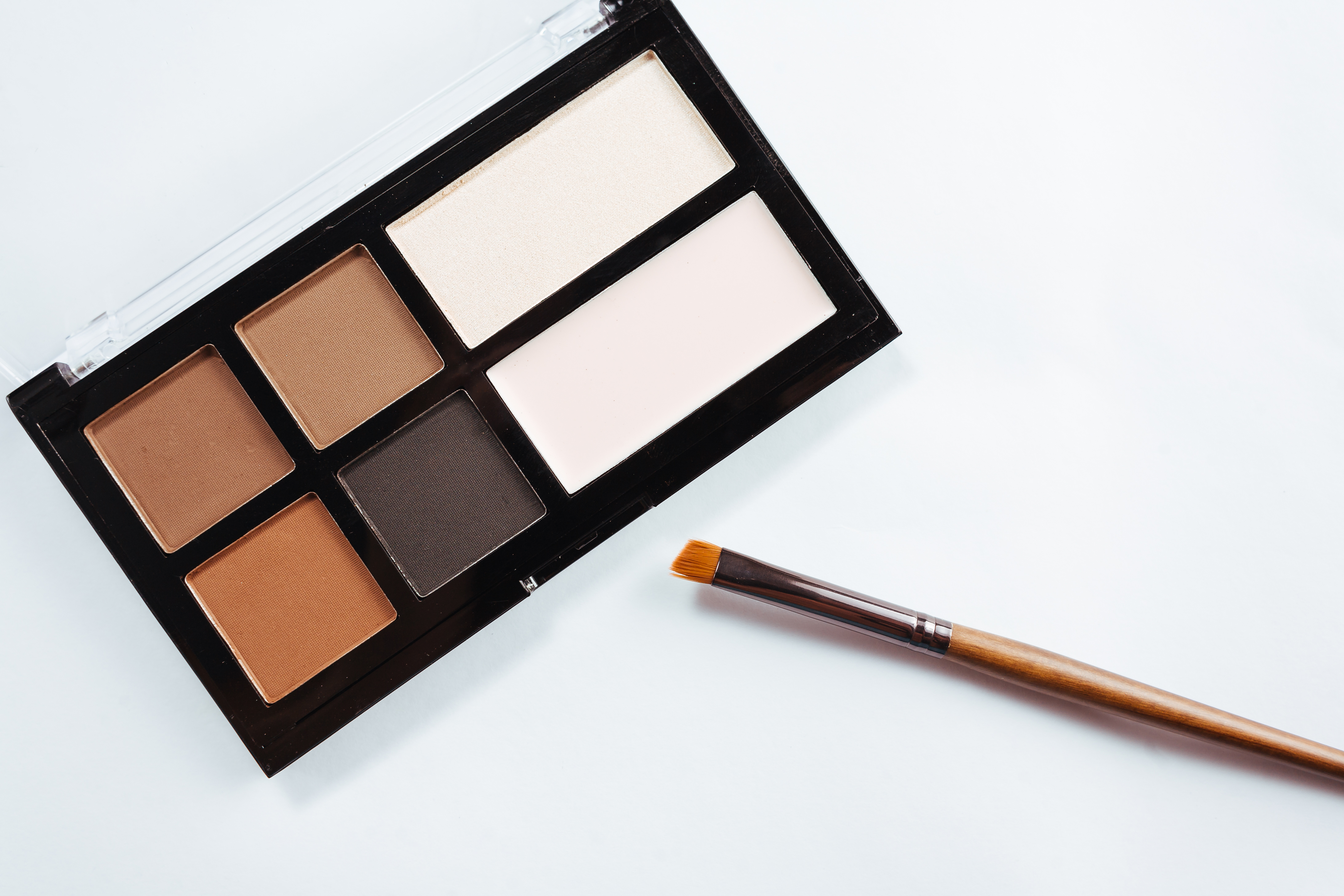 Eye shadow with brush on white background