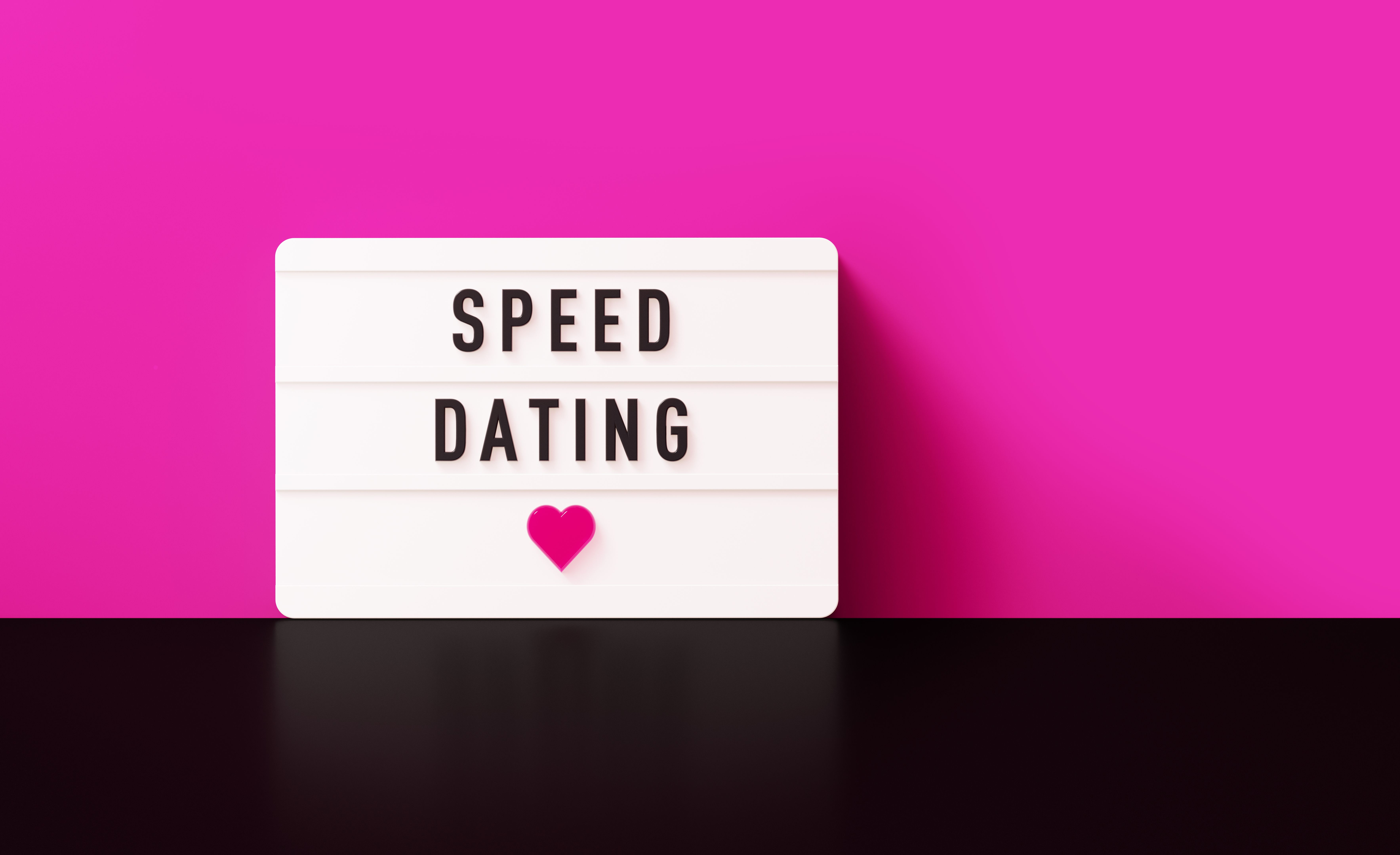 Speed Dating Written White Lightbox Before Pink Wall Speed Dating Written White Lightbox Before Pink Wall