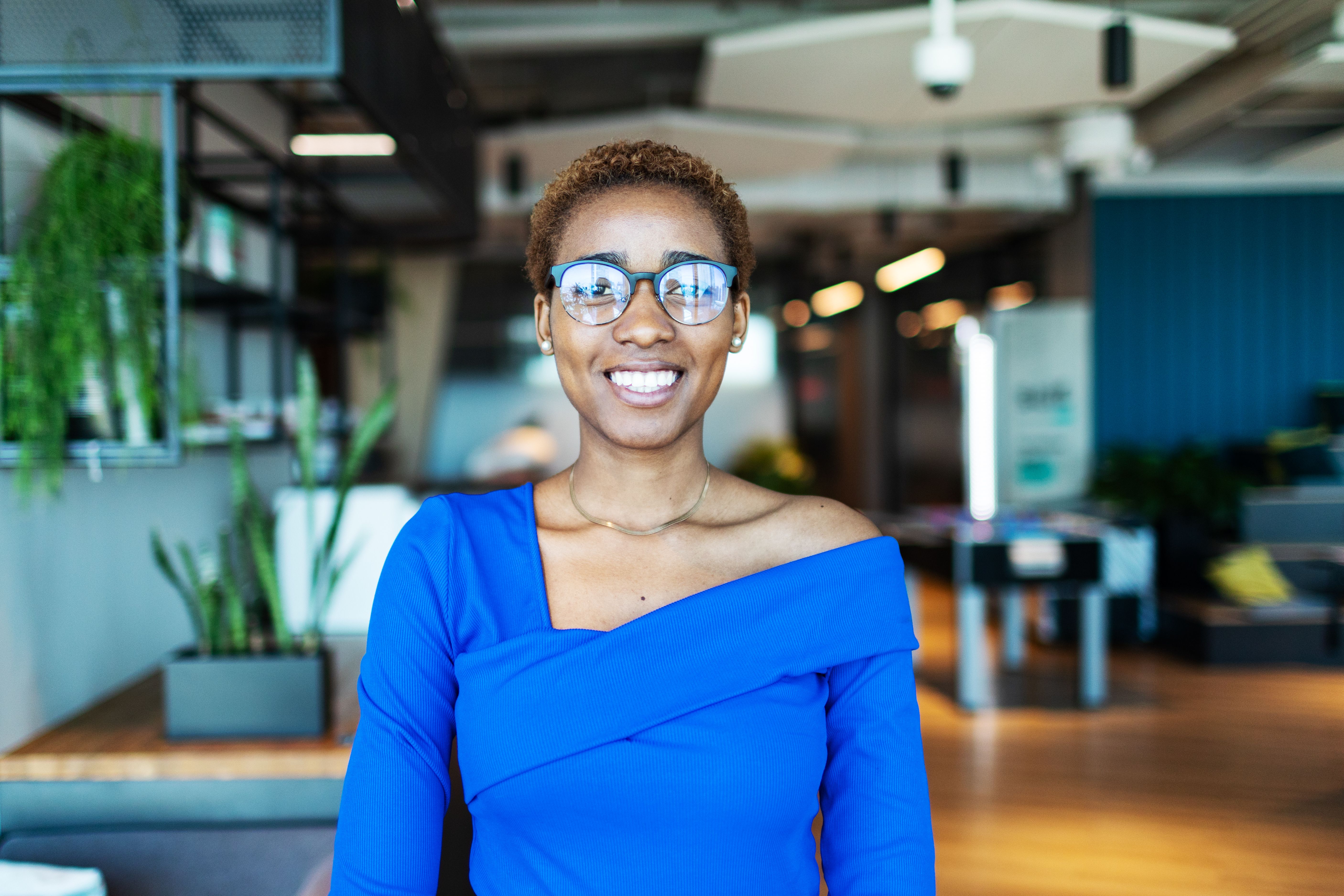 Young adult black businesswoman portrait at modern office