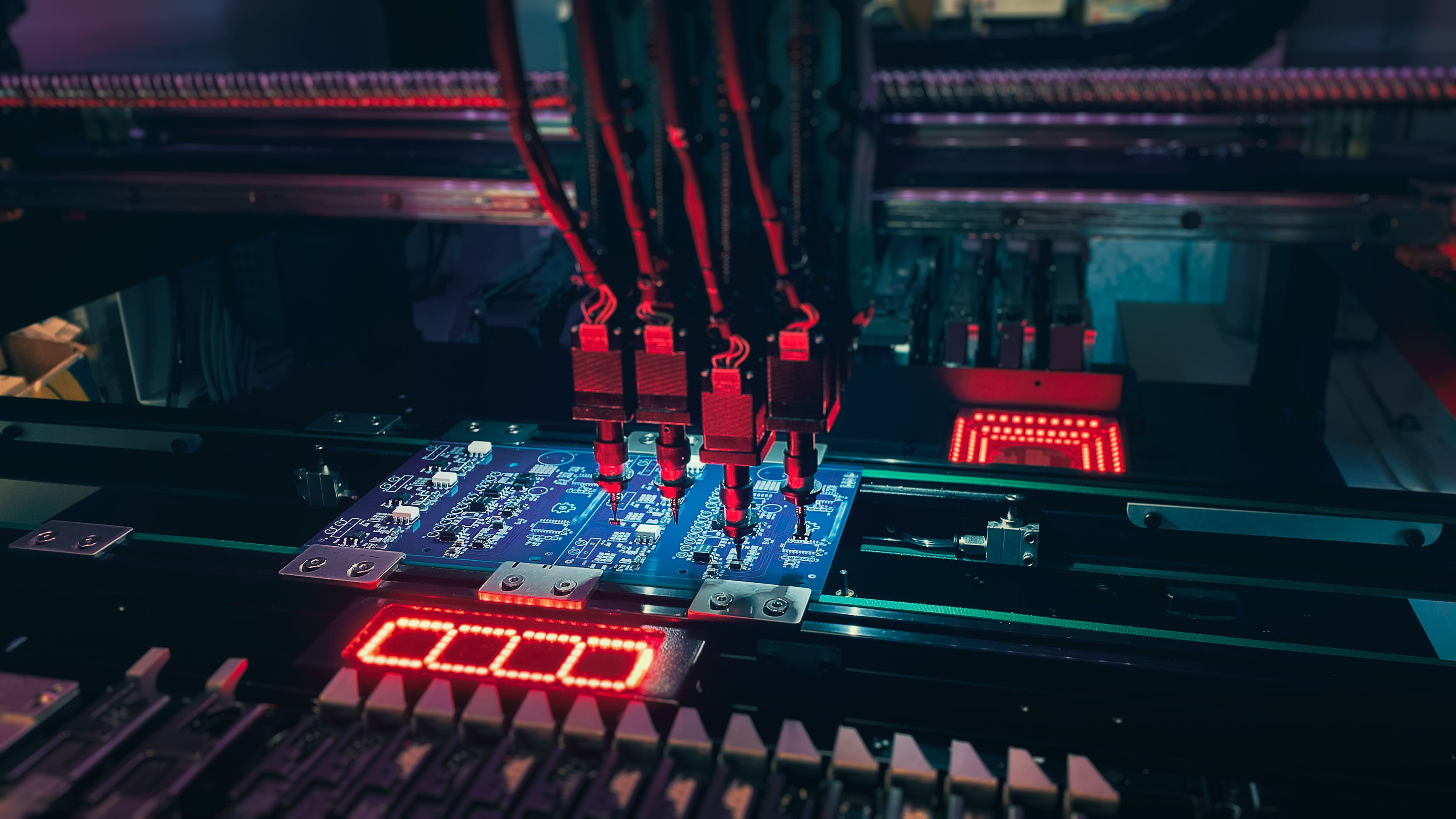 Pick and Place robot machine: SMD Assembly of electronic components on a motherboard