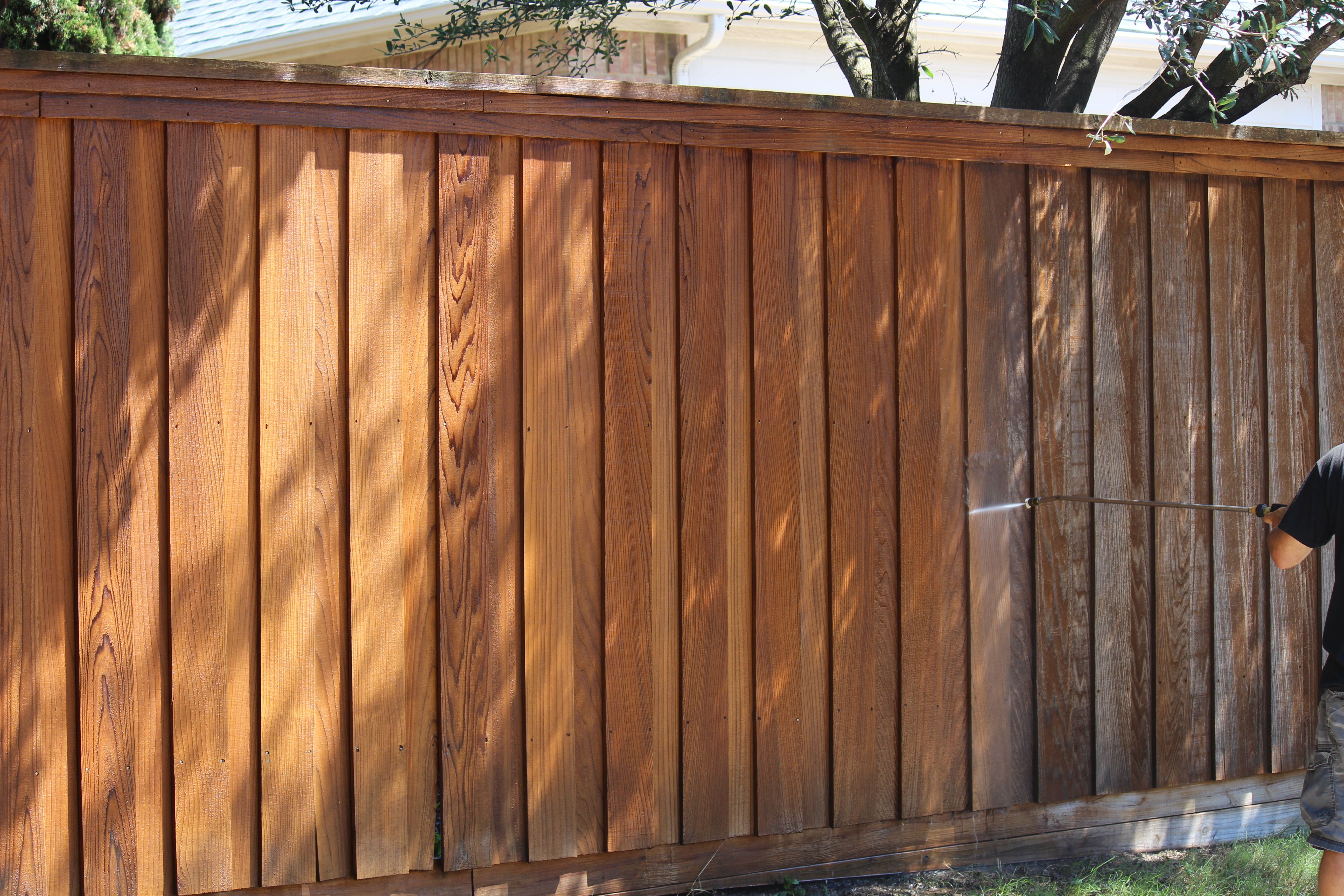 Pressure washing old fence