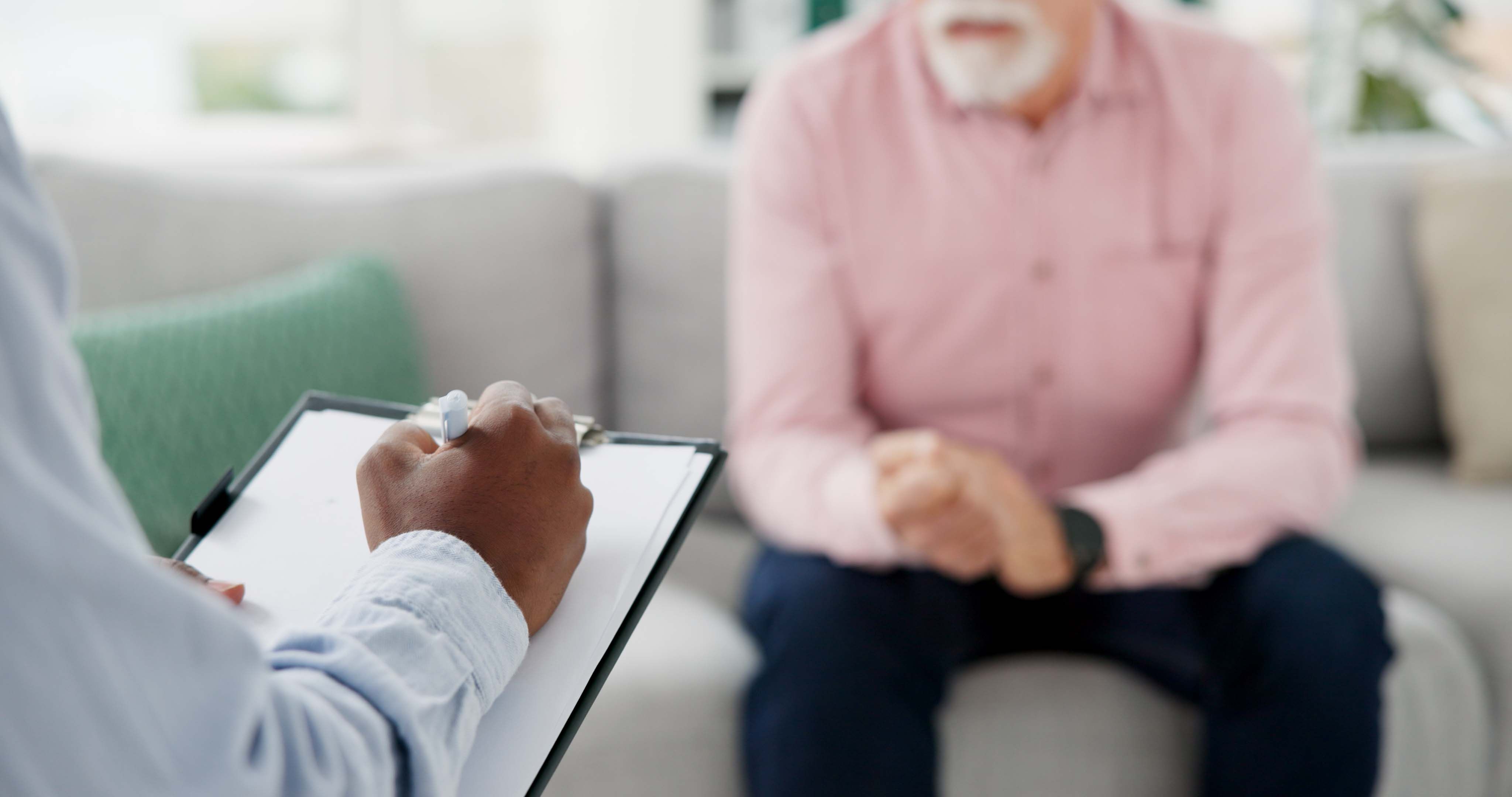 Writing, psychology and support with hands of therapist and patient for counseling, consulting and meeting. Mental health, rehabilitation and advice with closeup of people in office for life coaching