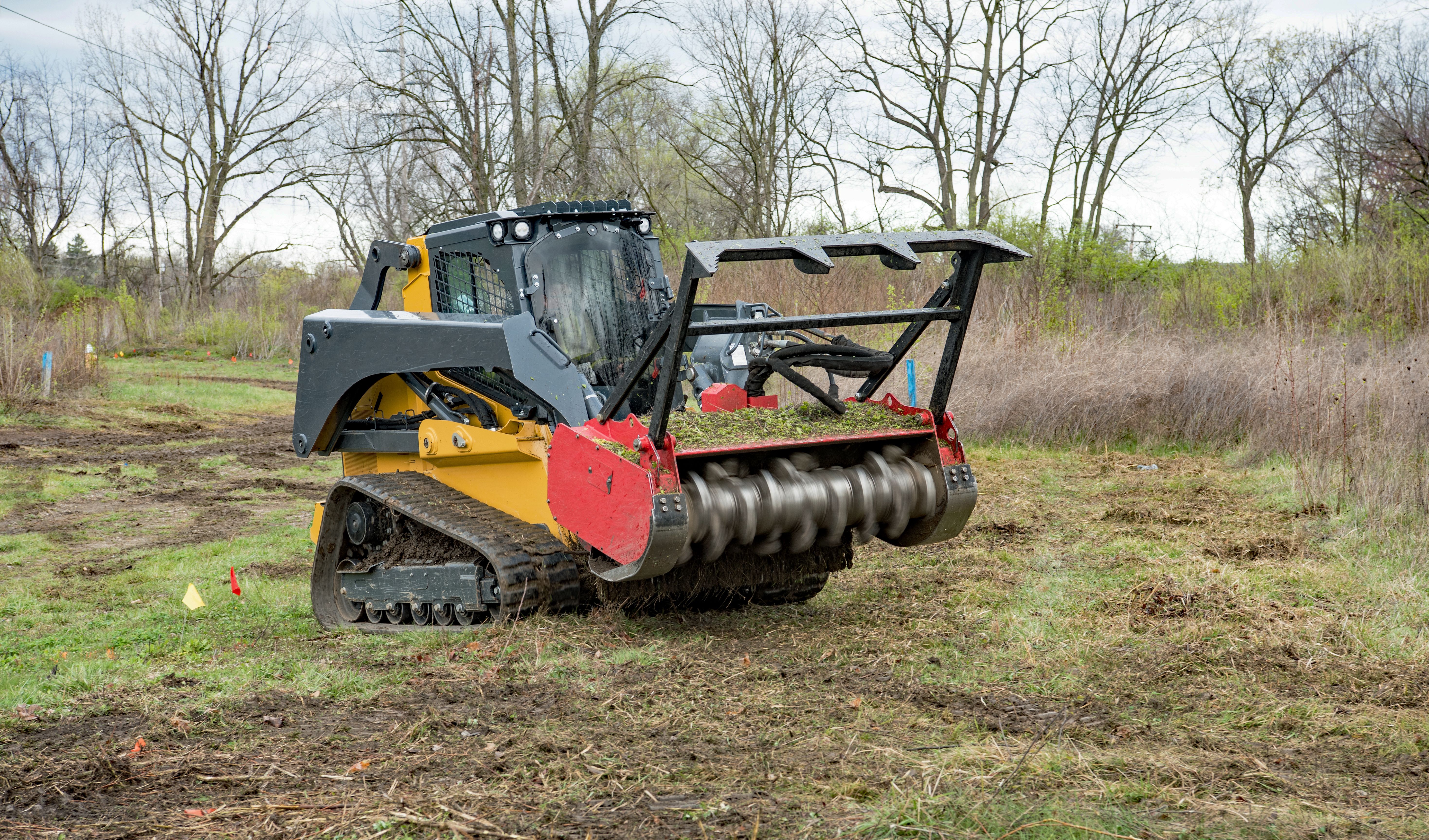Forestry Mulcher in Action Mulching Field Weeds Forestry Mulcher in Action Mulching Field Weeds