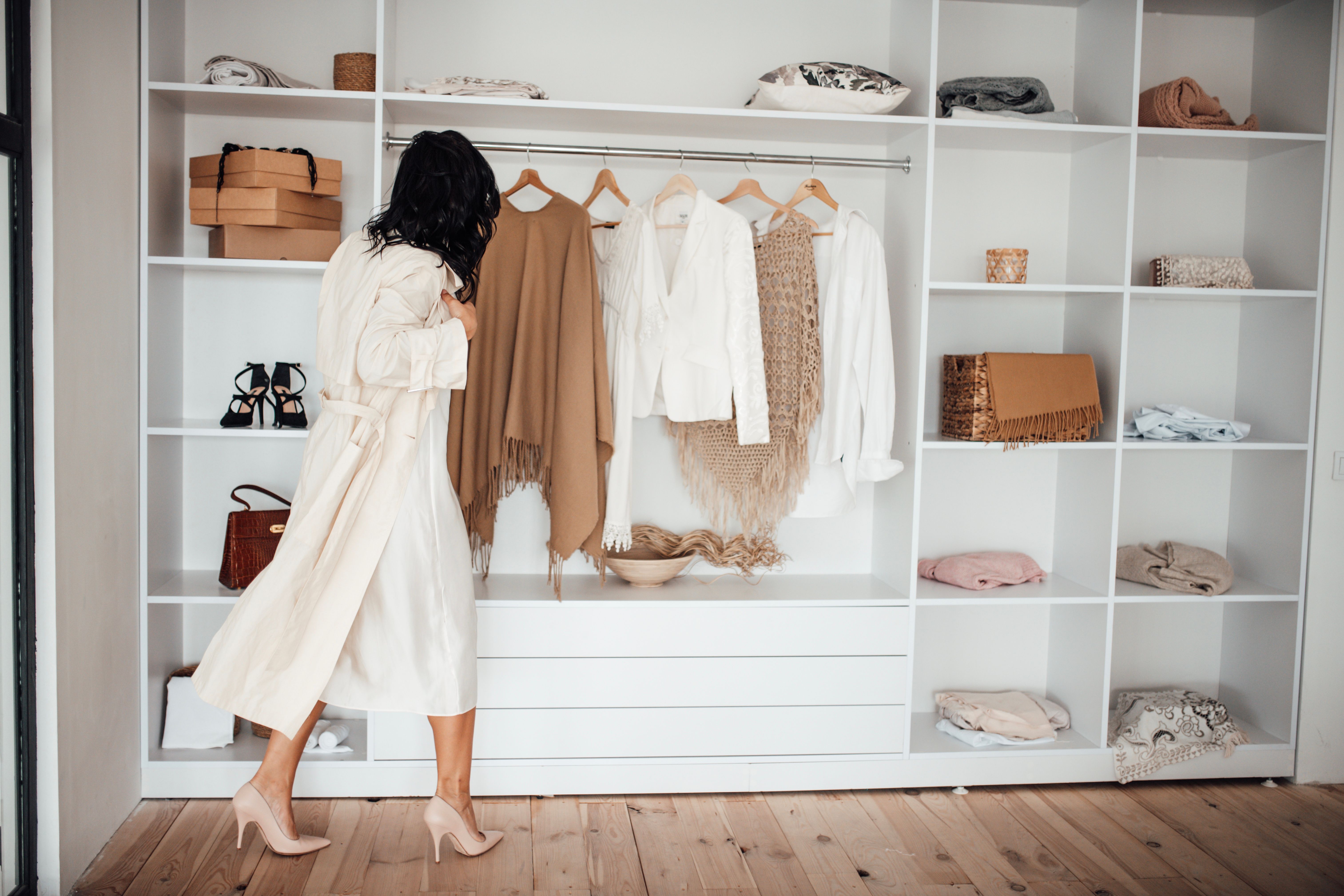 Rear View Of Woman Standing In Clothing Store