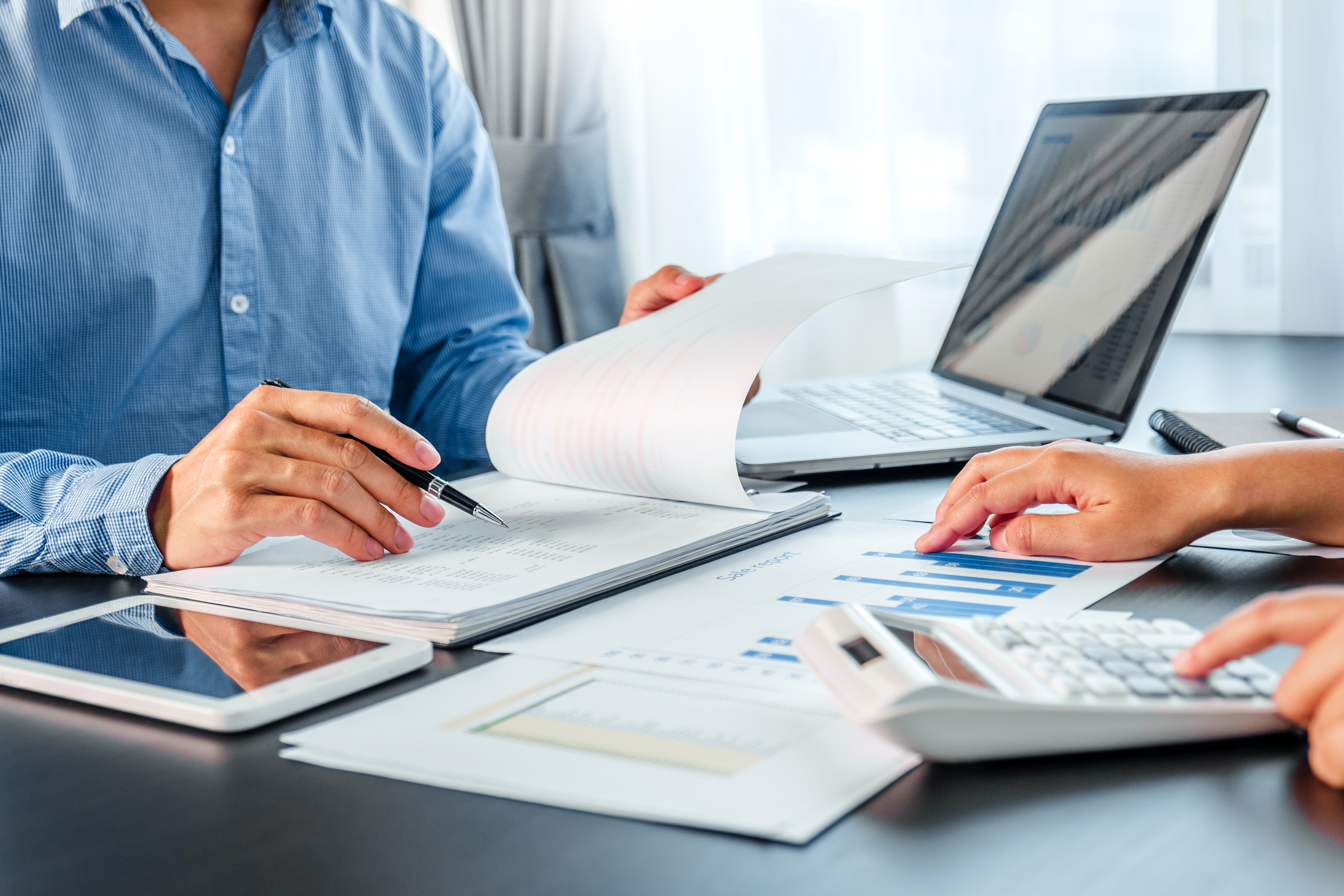 Business team meeting Strategy Planning with new startup project plan Finance and Economy Graph with laptop successful teamwork