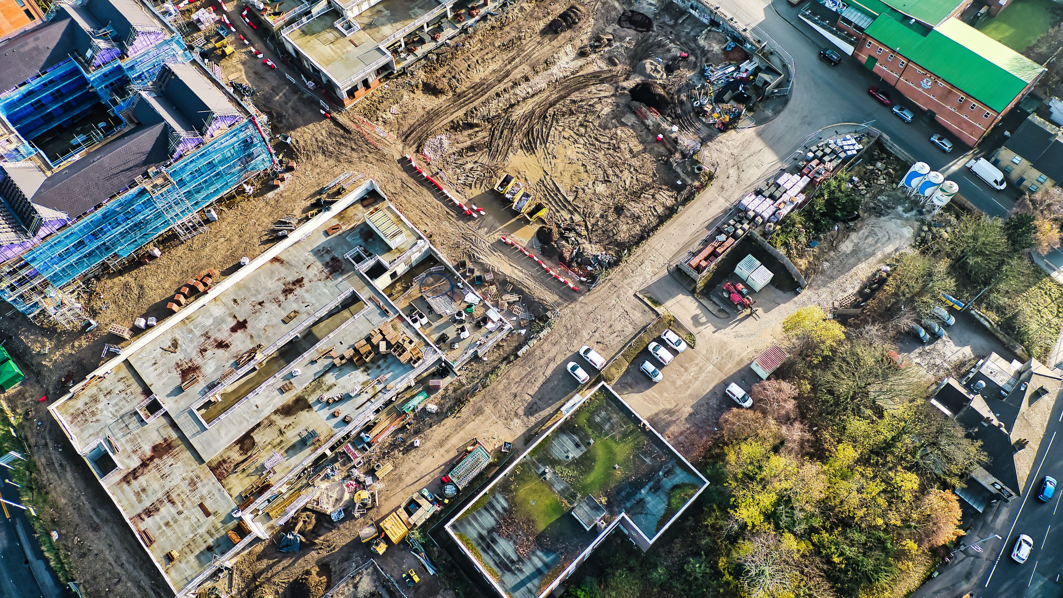 Aerial View of Construction Site with Buildings and Excavated Land  in Kirkstall, Leeds.