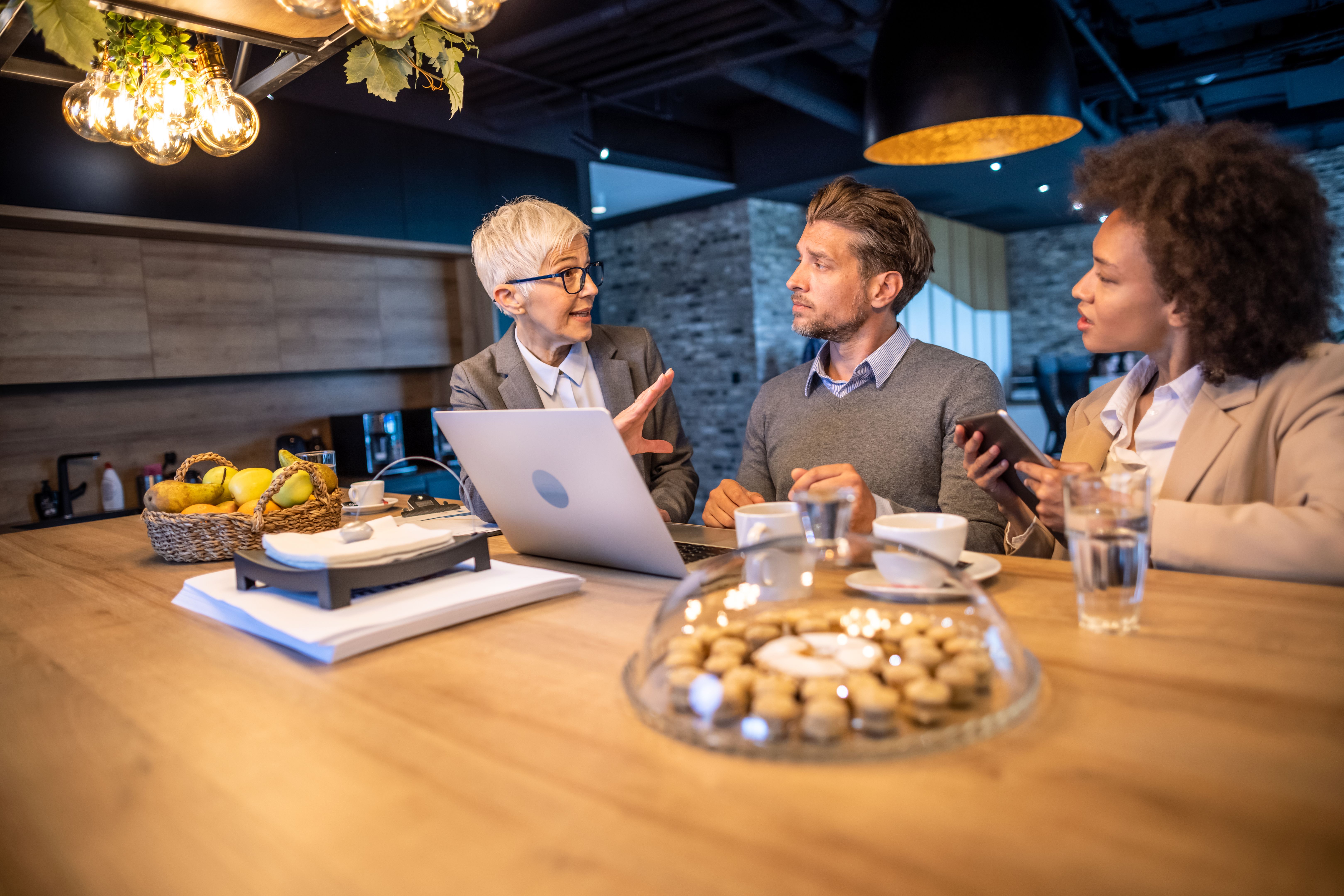 Business people having discussion on a coffee break Business people having discussion on a coffee break