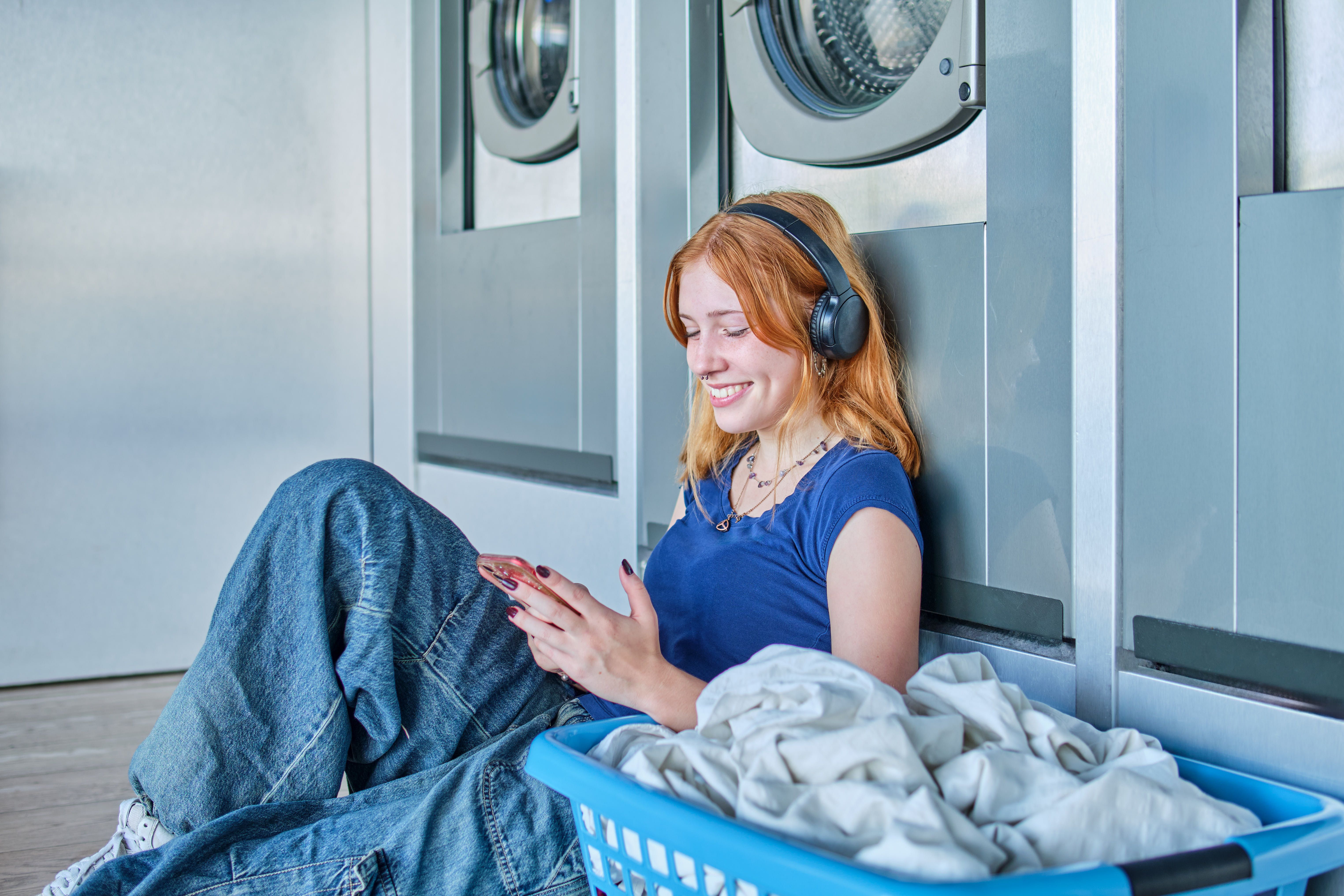 students doing laundry