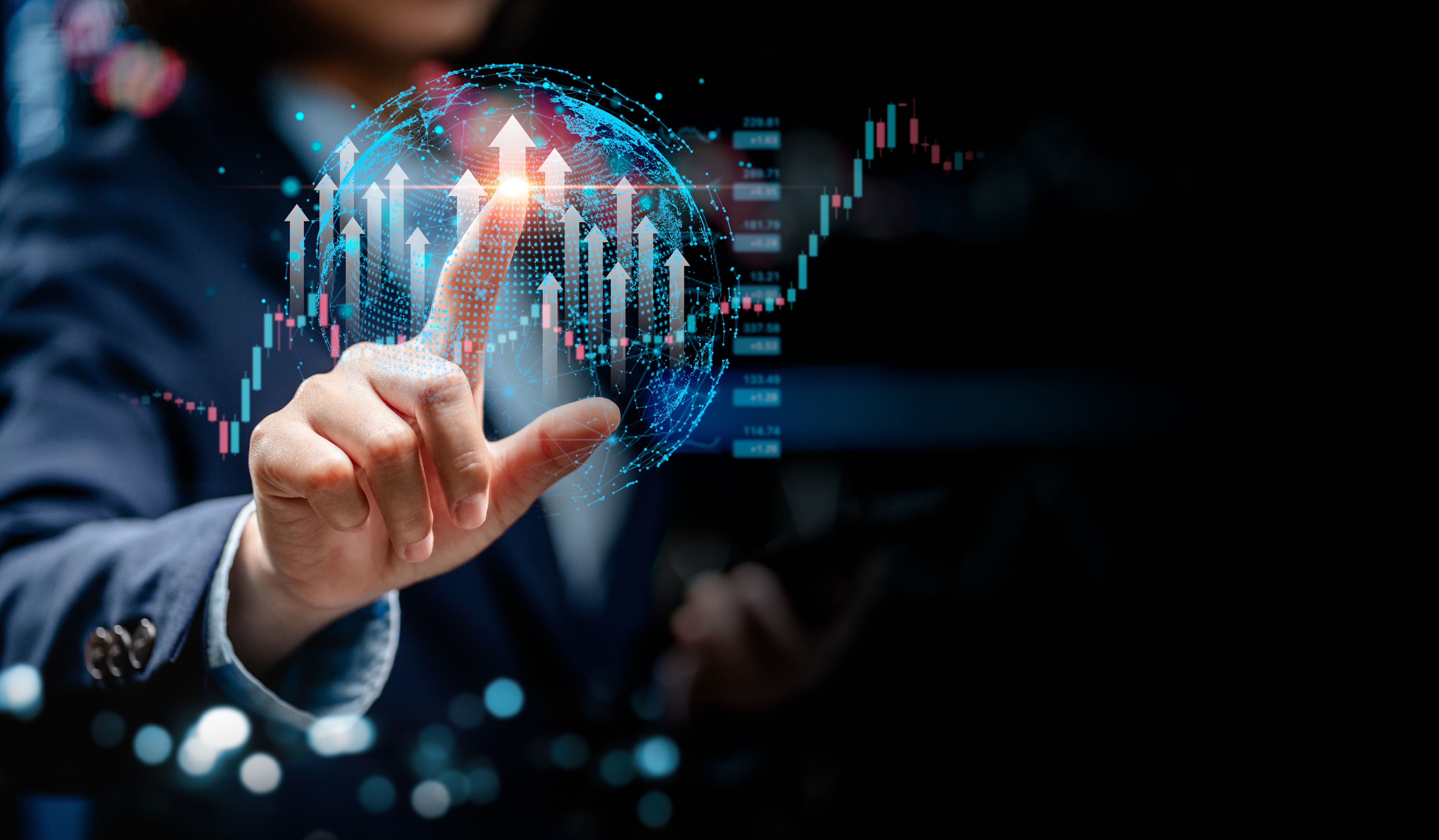 Businesswomen point to virtual screens of graph stock market changes in the global interface, uptrends, growth economic, business strategy development, and find opportunities for investment.
