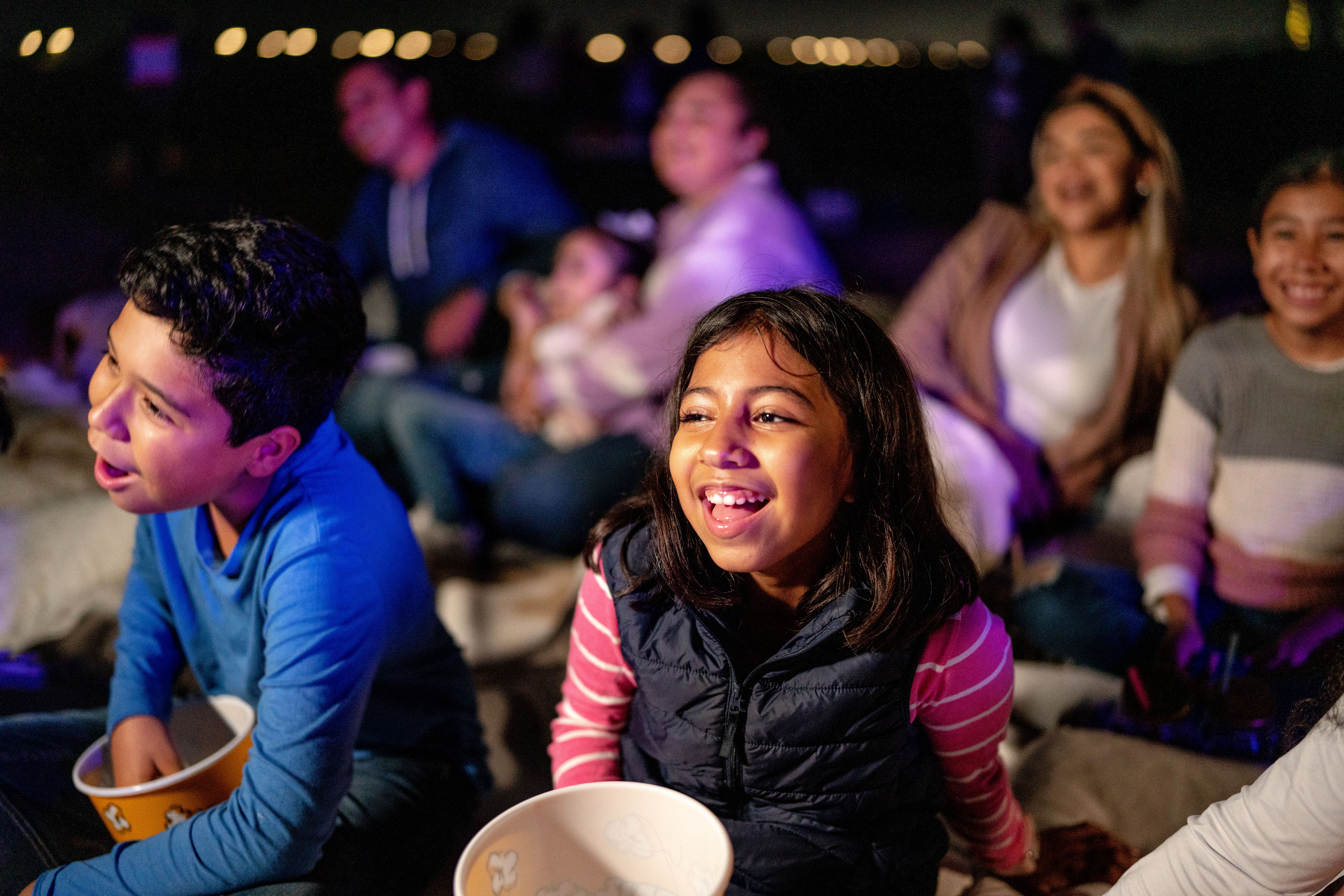 family enjoying show