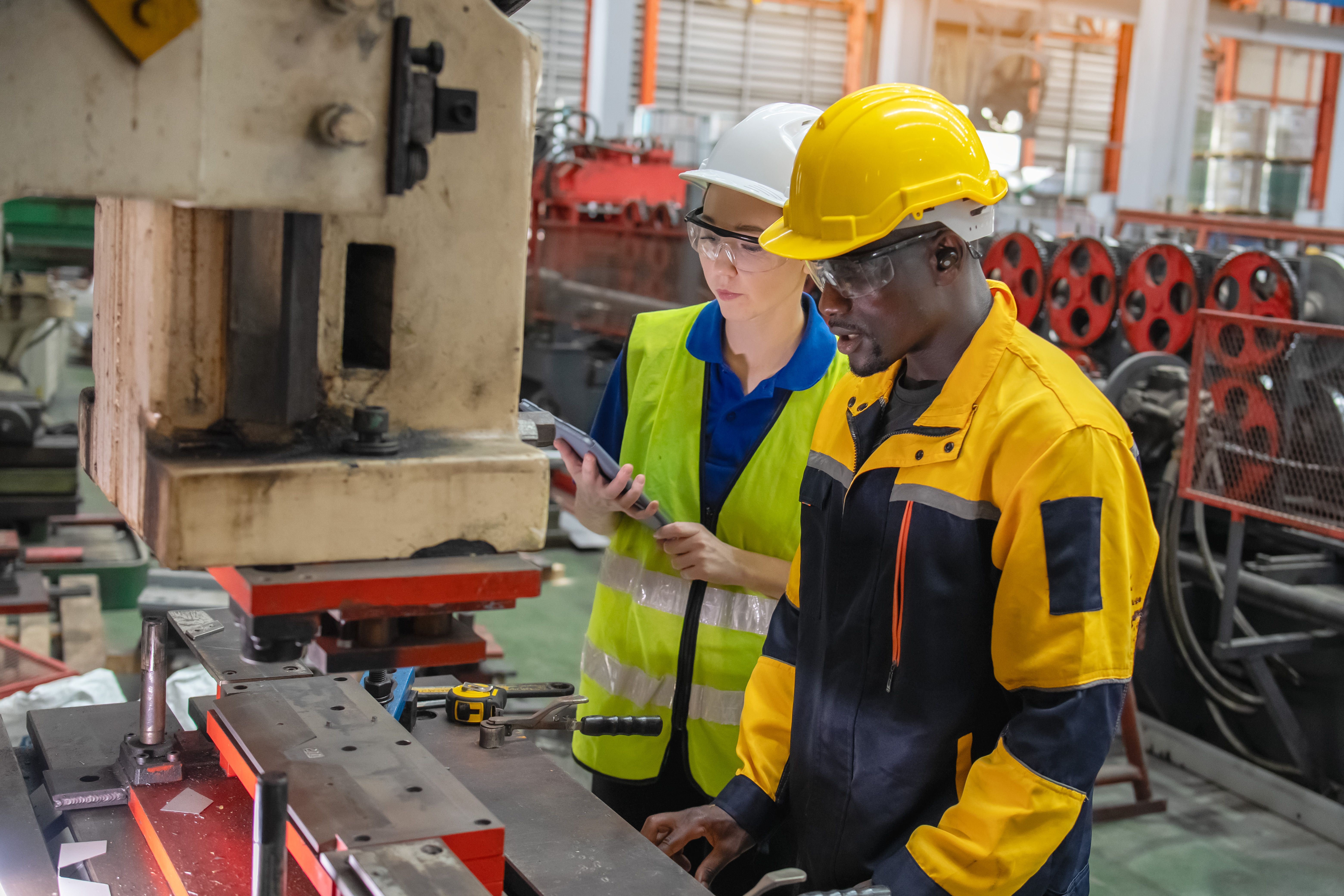 stamping plant workers