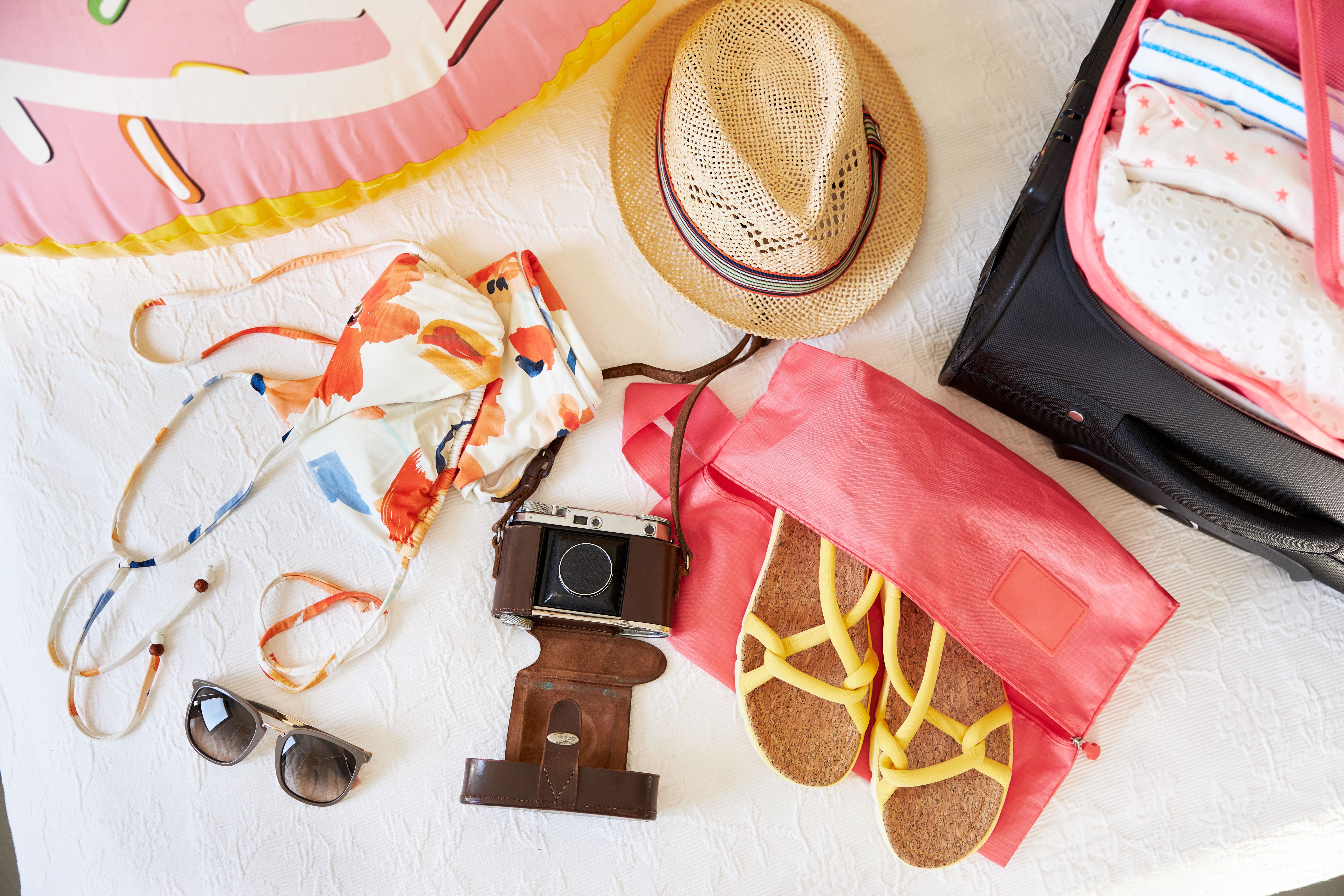 Various items as details or flatlay of a holiday trip or beach vacation Various items as details or flatlay of a holiday trip or beach vacation