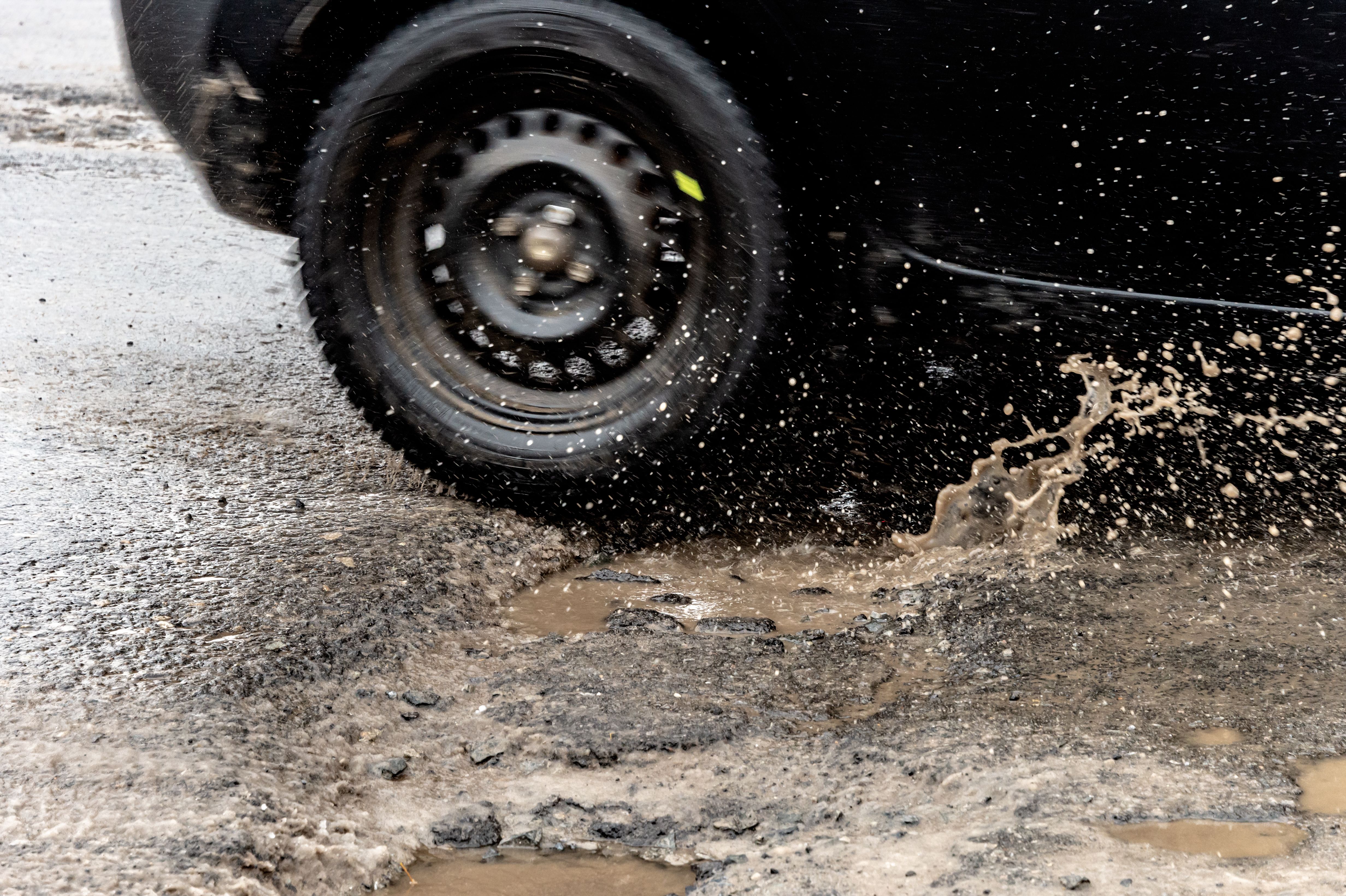car tires potholes
