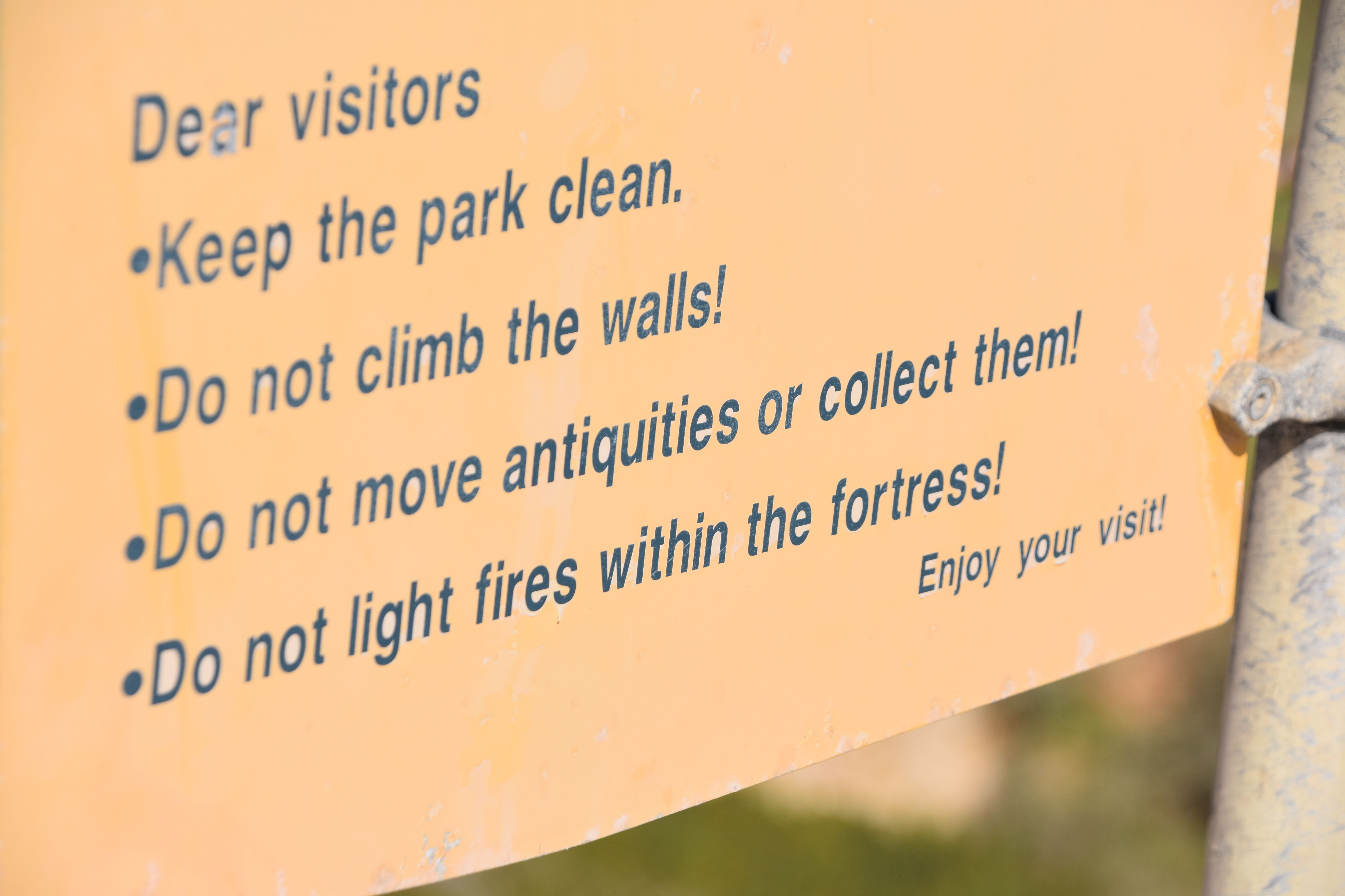 A sign in an antiquities park A sign in an antiquities park
