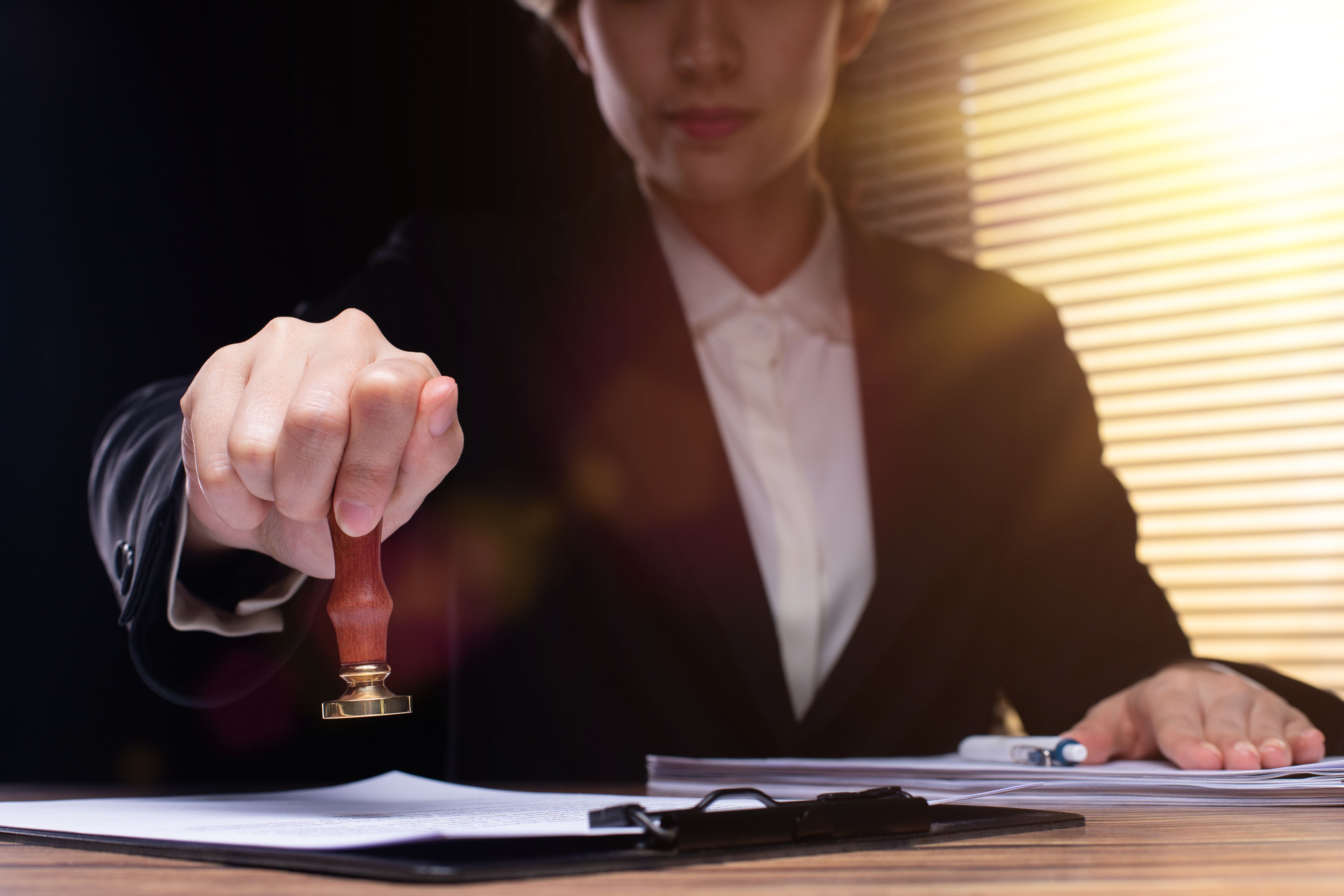 Professional Businesswoman do legal justice document agreement with Lawyer person desk workplace. Authority working for criminal justice as confident notary contract indoor, copy space