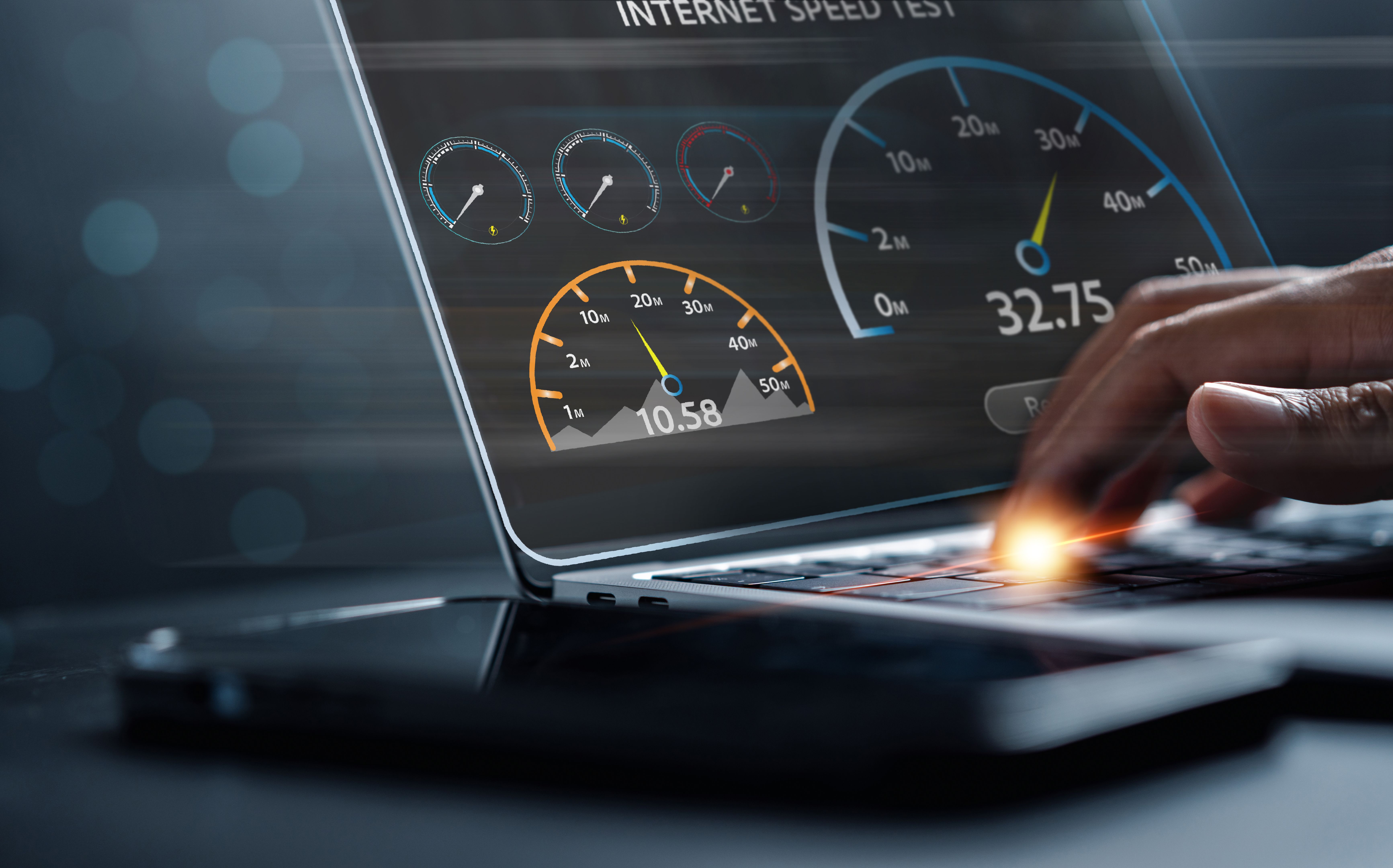 Super Fast internet connection speedtest bandwidth network technology, Man using Internet high speed by smartphone and laptop computer, 5G quality, speed optimization. Super Fast internet connection speedtest bandwidth network technology, Man using Internet high speed by smartphone and laptop computer, 5G quality, speed optimization.