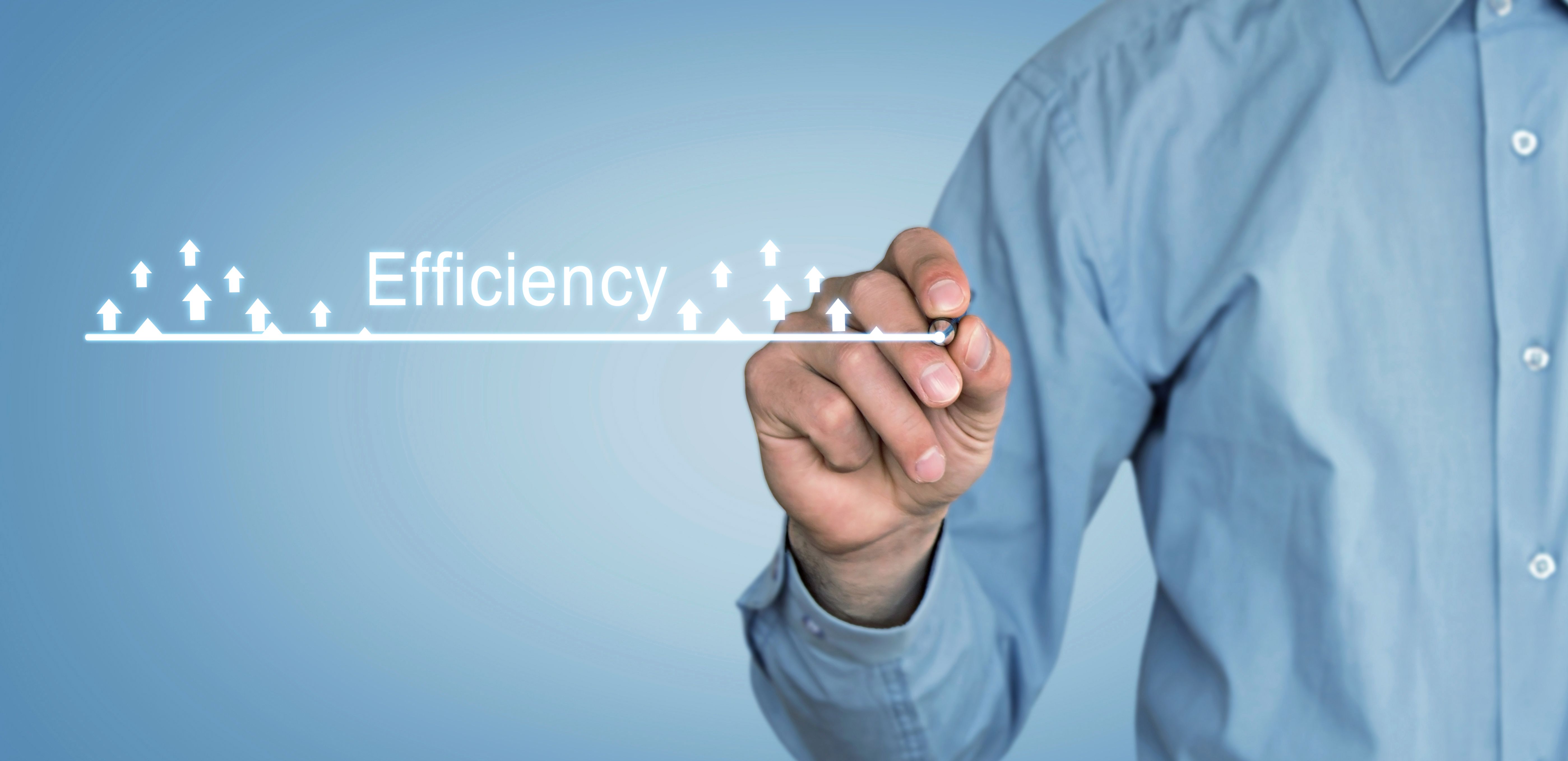 Businessman writes a Efficiency concept. Business Growth concept