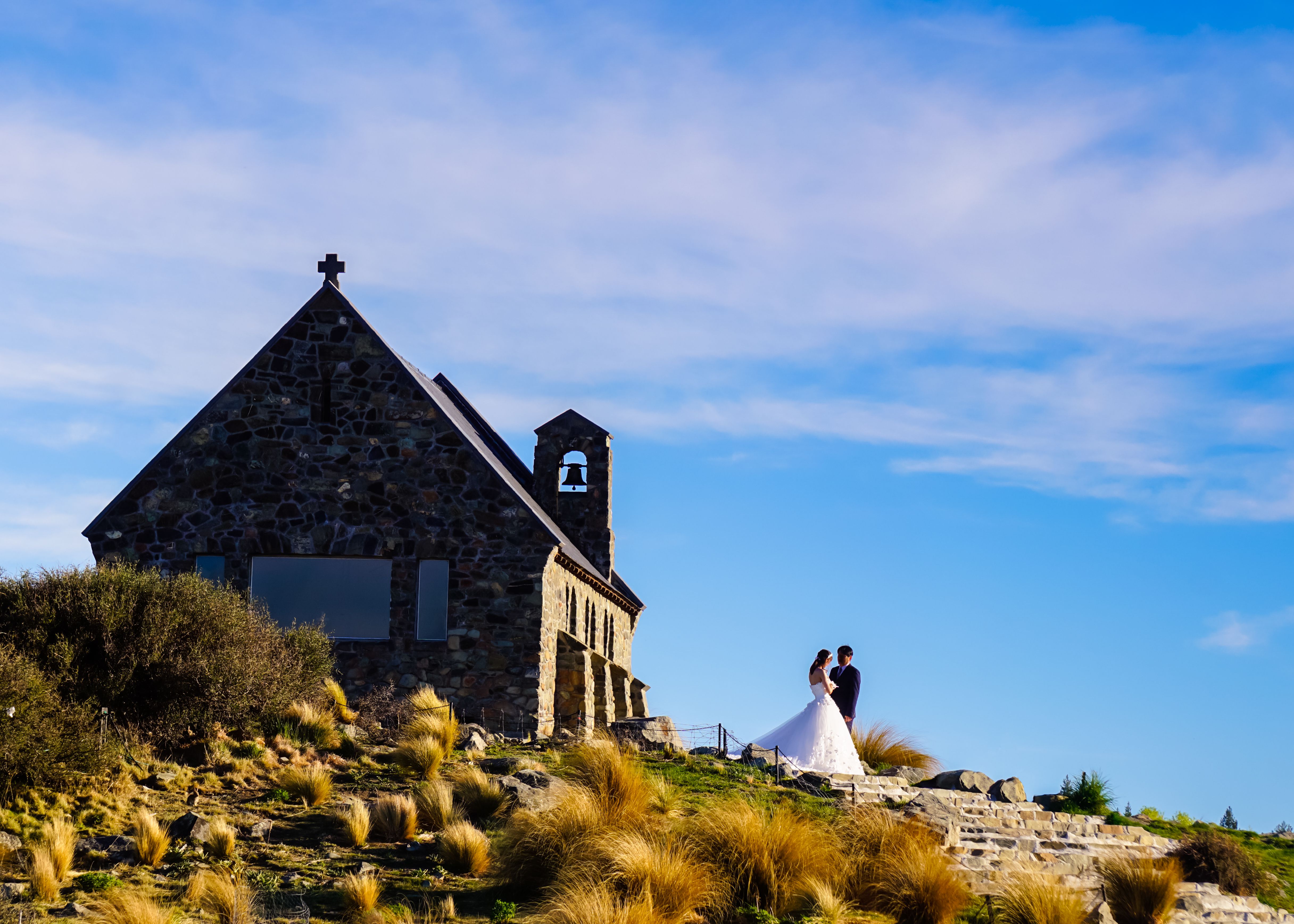 Groom and bride at the church of the good shepherd Groom and bride at the church of the good shepherd