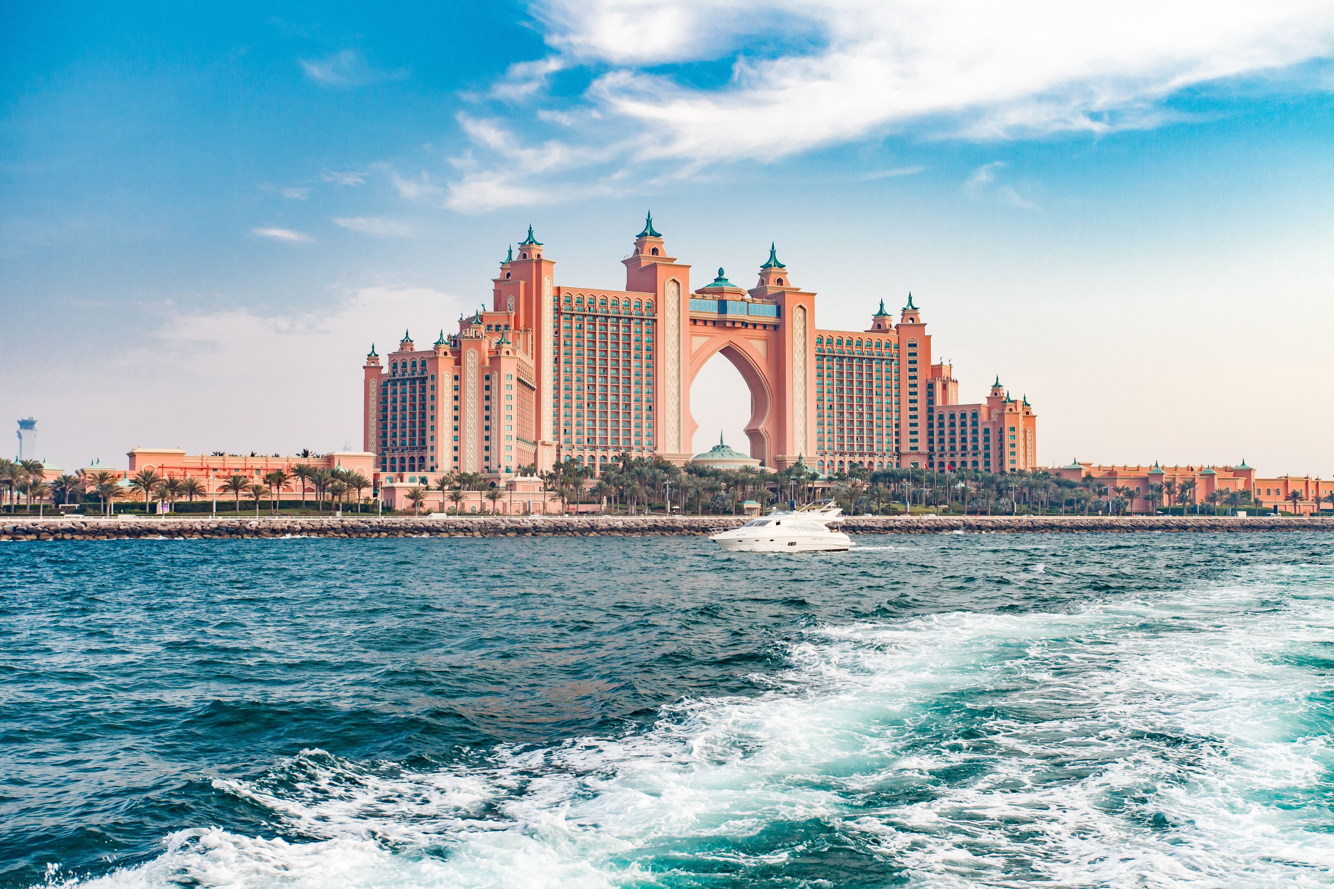 Palm Jumeirah, Atlantis The Palm, white yacht sailing on water