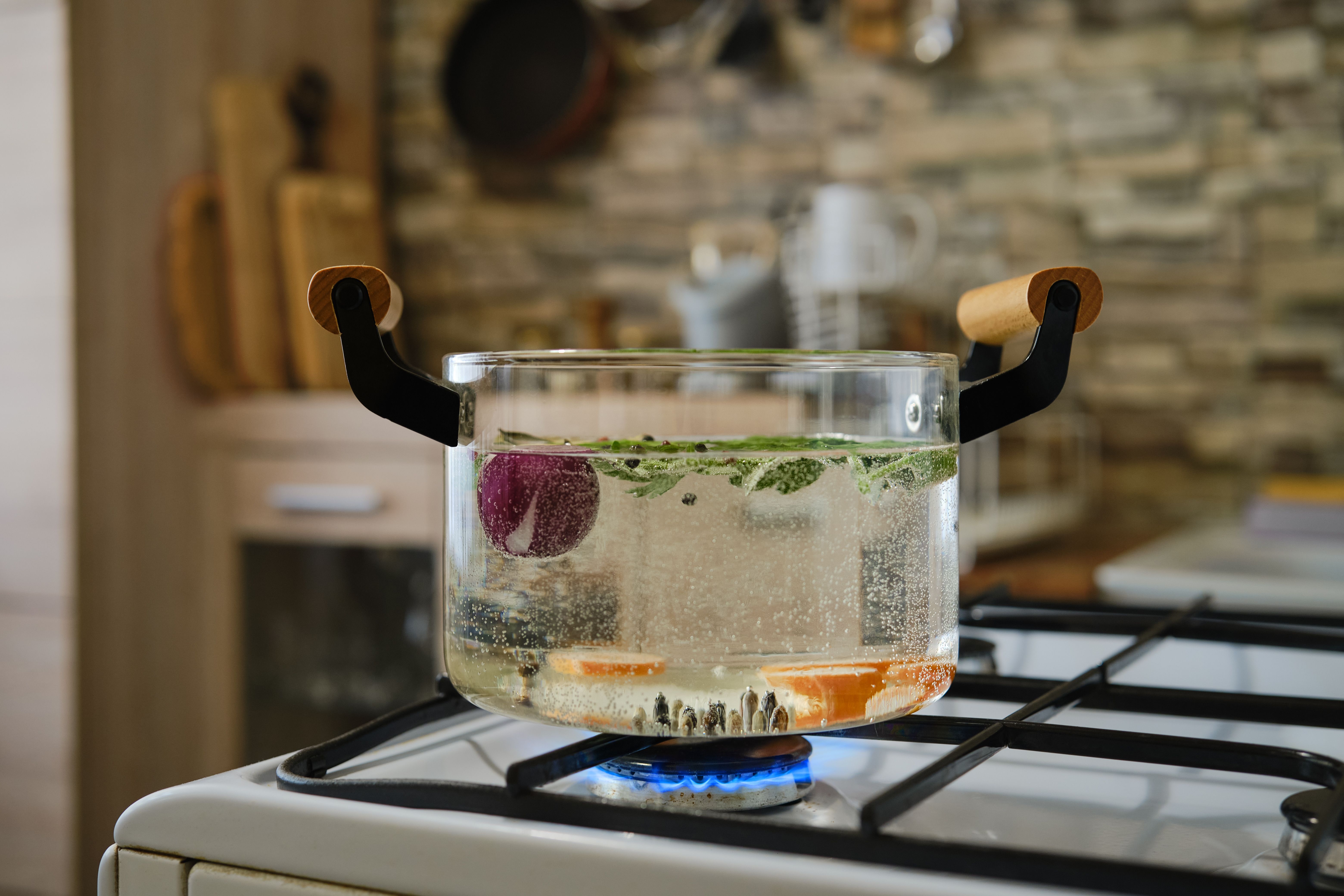 Herbal tea boiling in borosilicate glass teapot, non toxic,  eco-friendly tea products.