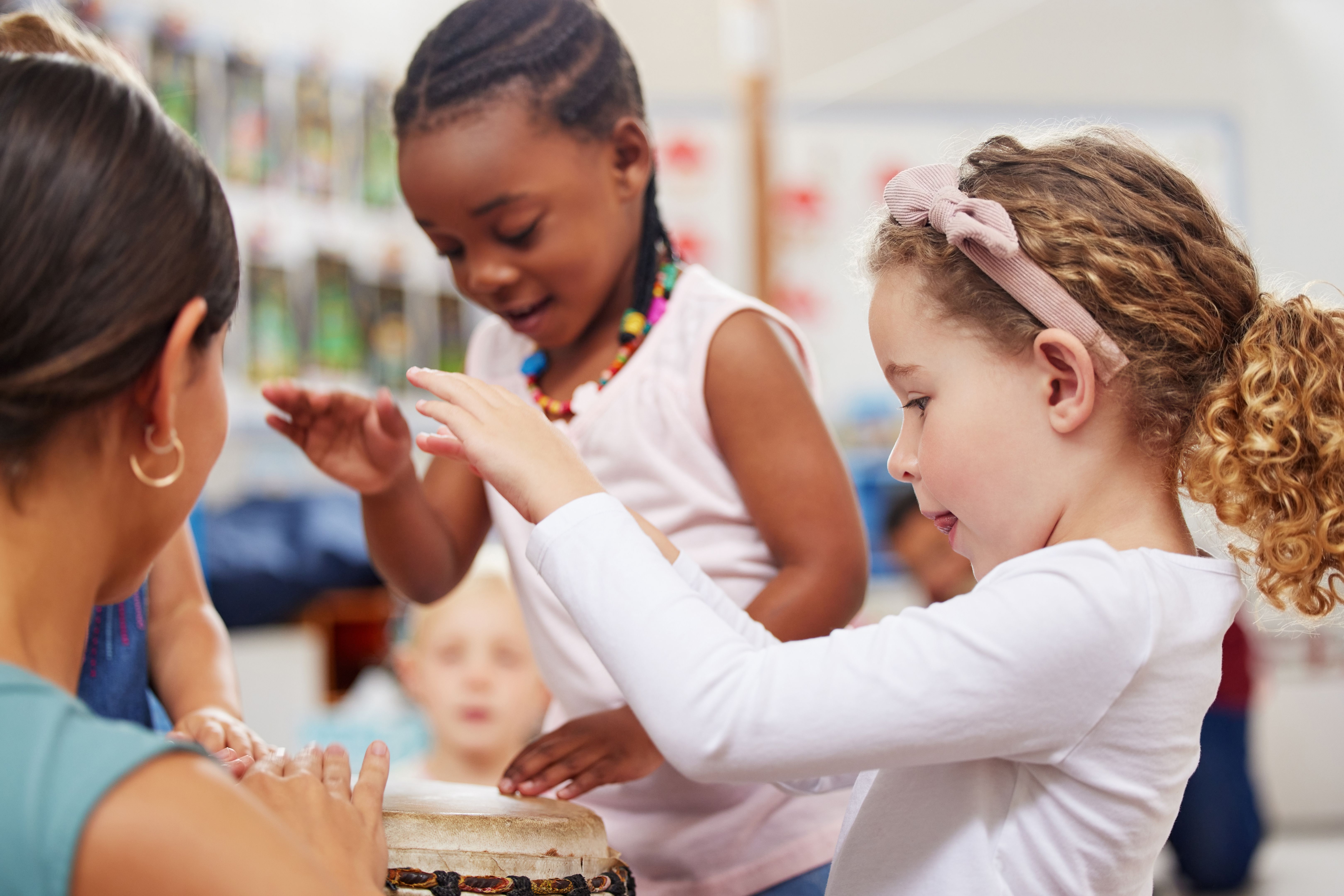 children practicing music