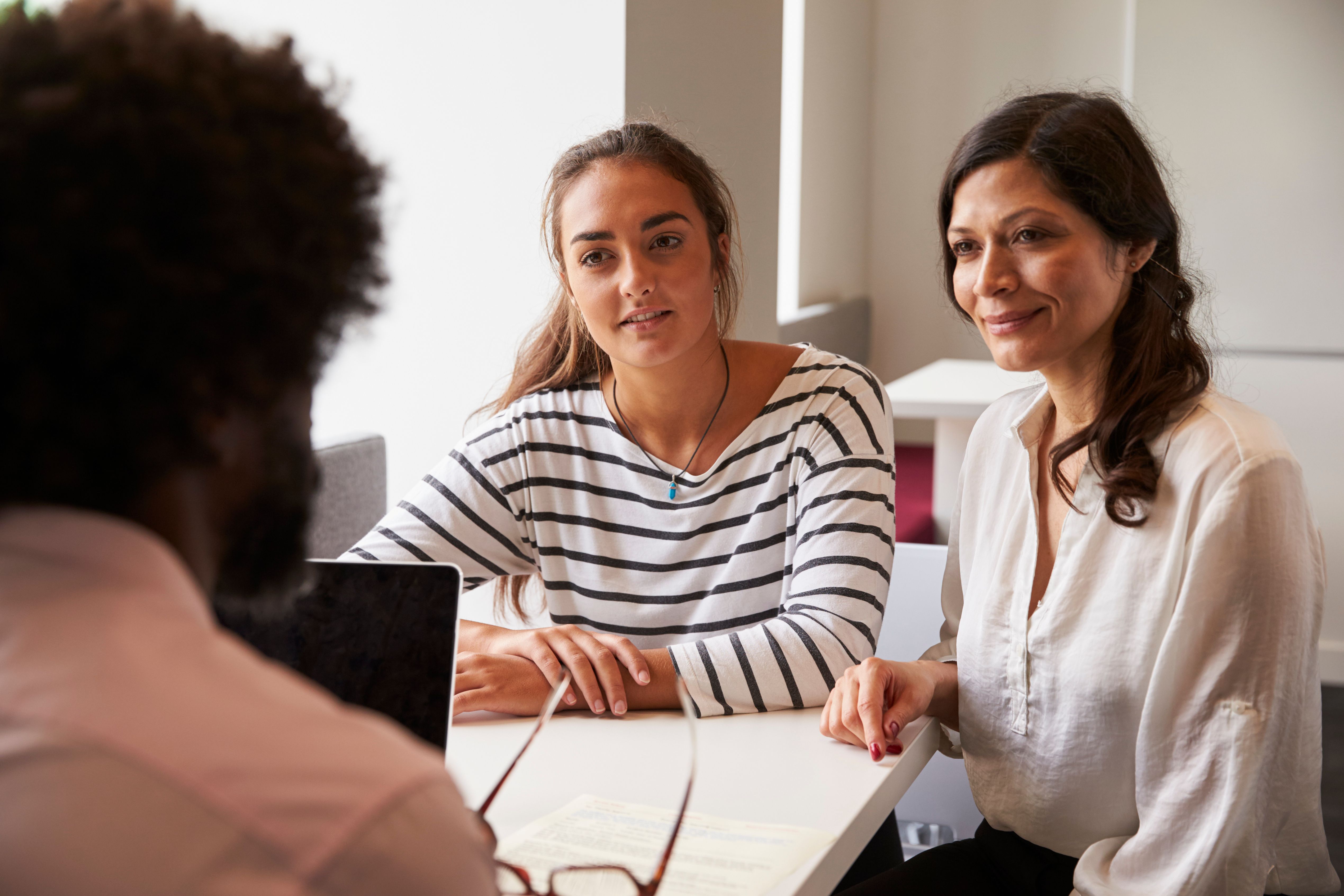 Mother And Daughter Meeting With Male Teacher Mother And Daughter Meeting With Male Teacher