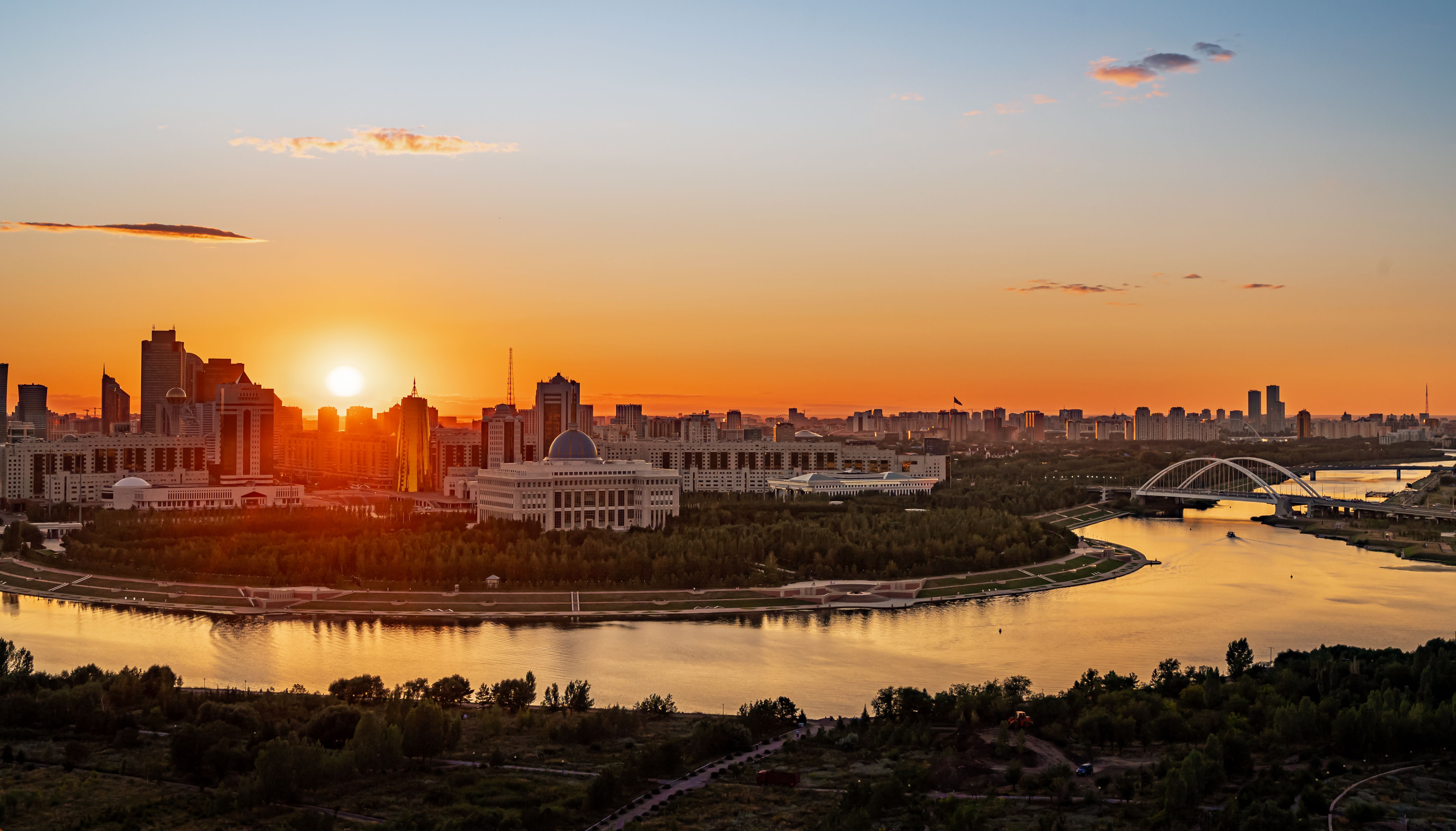 Sunset over the central part of the capital with a view of the Akorda Presidential Palace. The view from the height. Astana, Kazakhstan Sunset over the central part of the capital with a view of the Akorda Presidential Palace. The view from the height. Astana, Kazakhstan