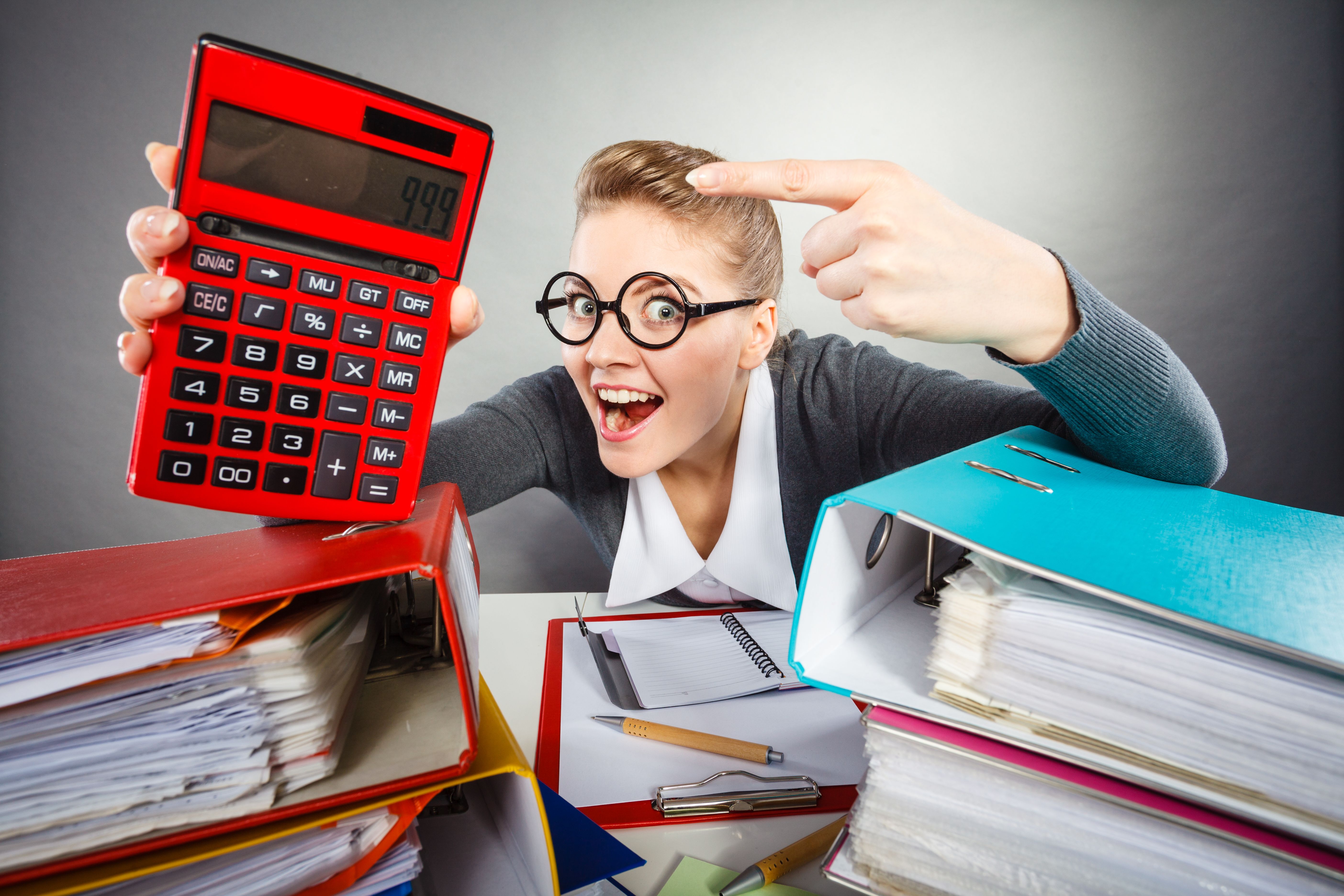 Workaholic secretary making gestures. Workaholic secretary making gestures.