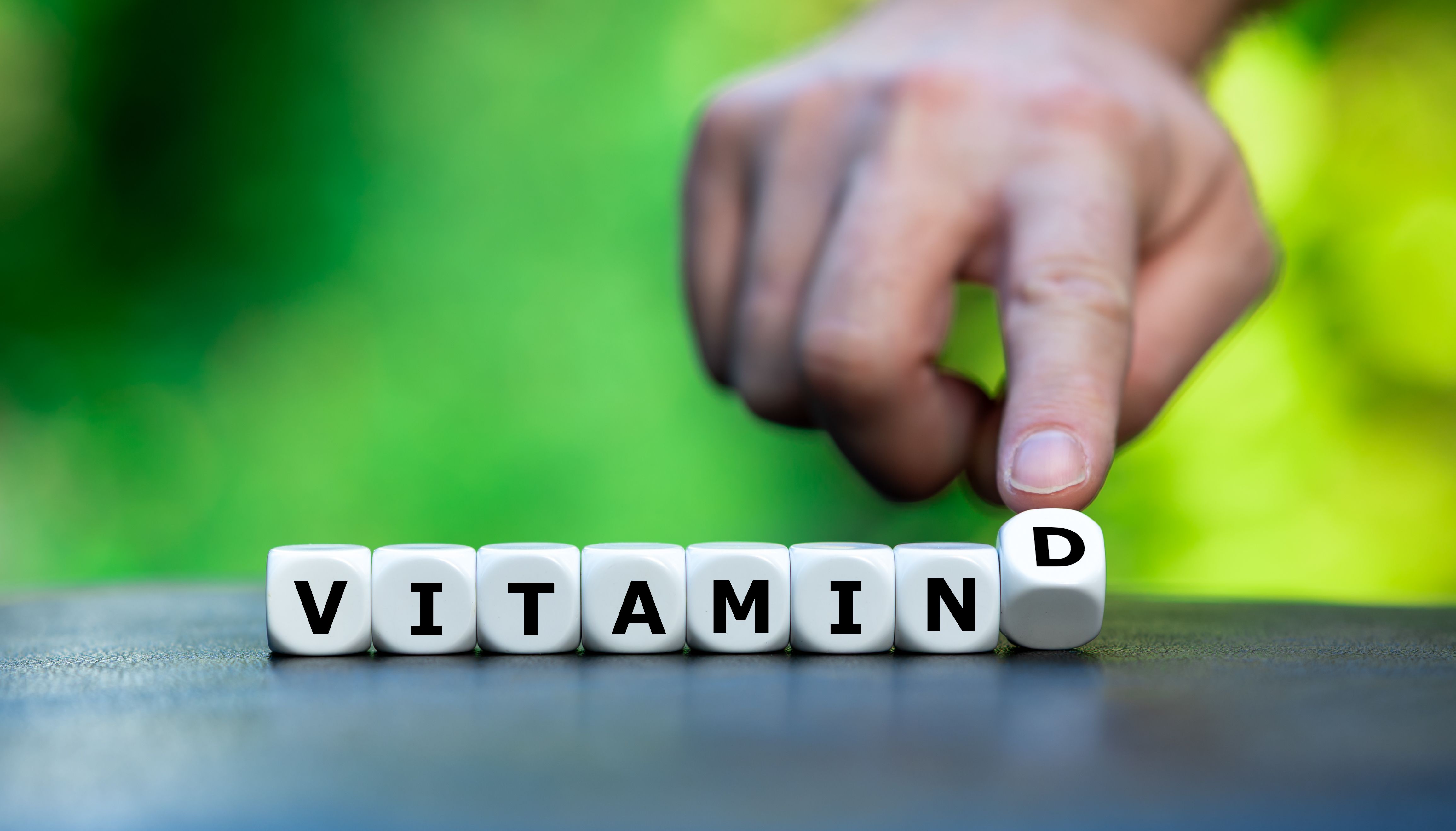 Dice form the expression 'Vitamin D'.