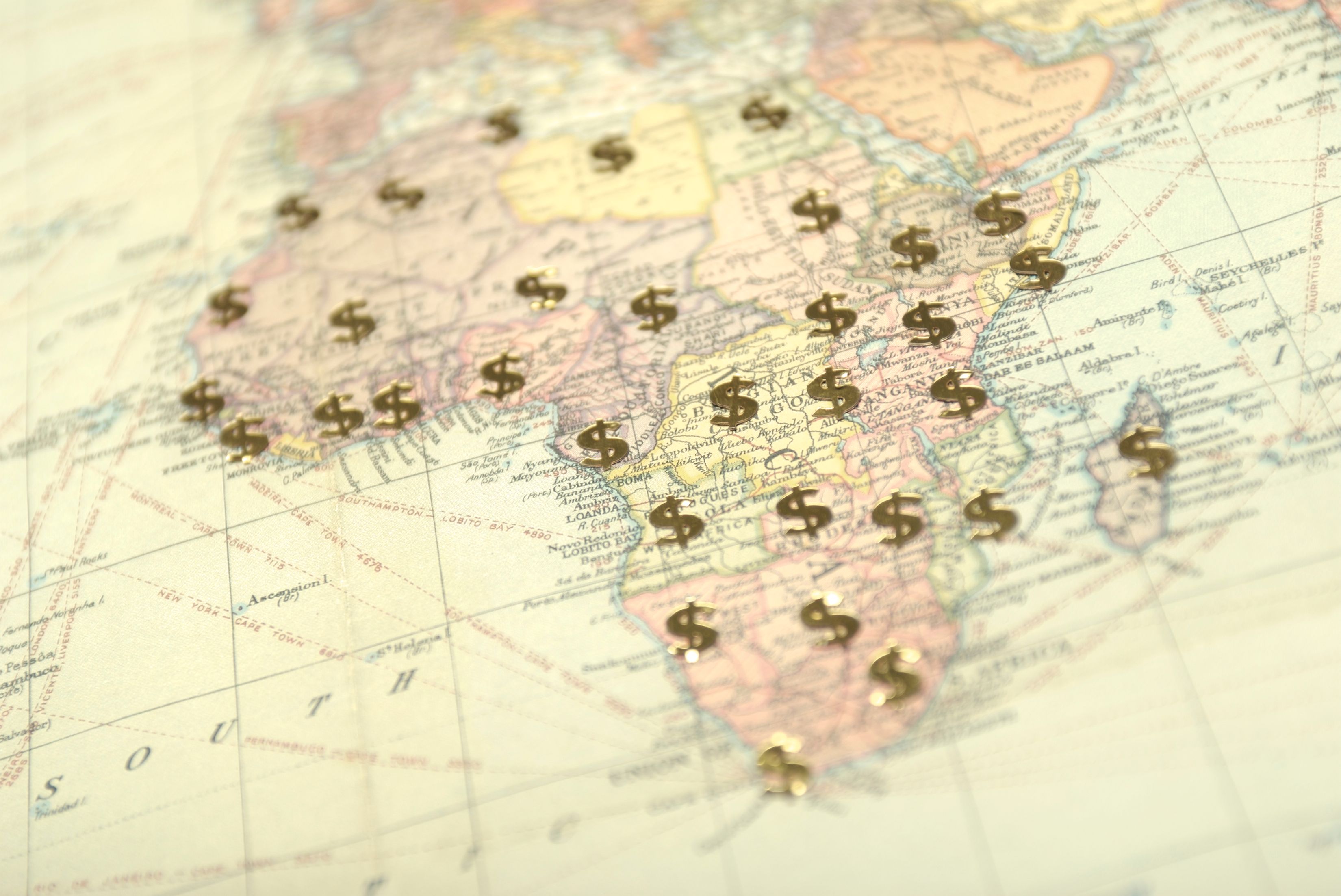 Aid in Africa Dolllar Signs on the Map