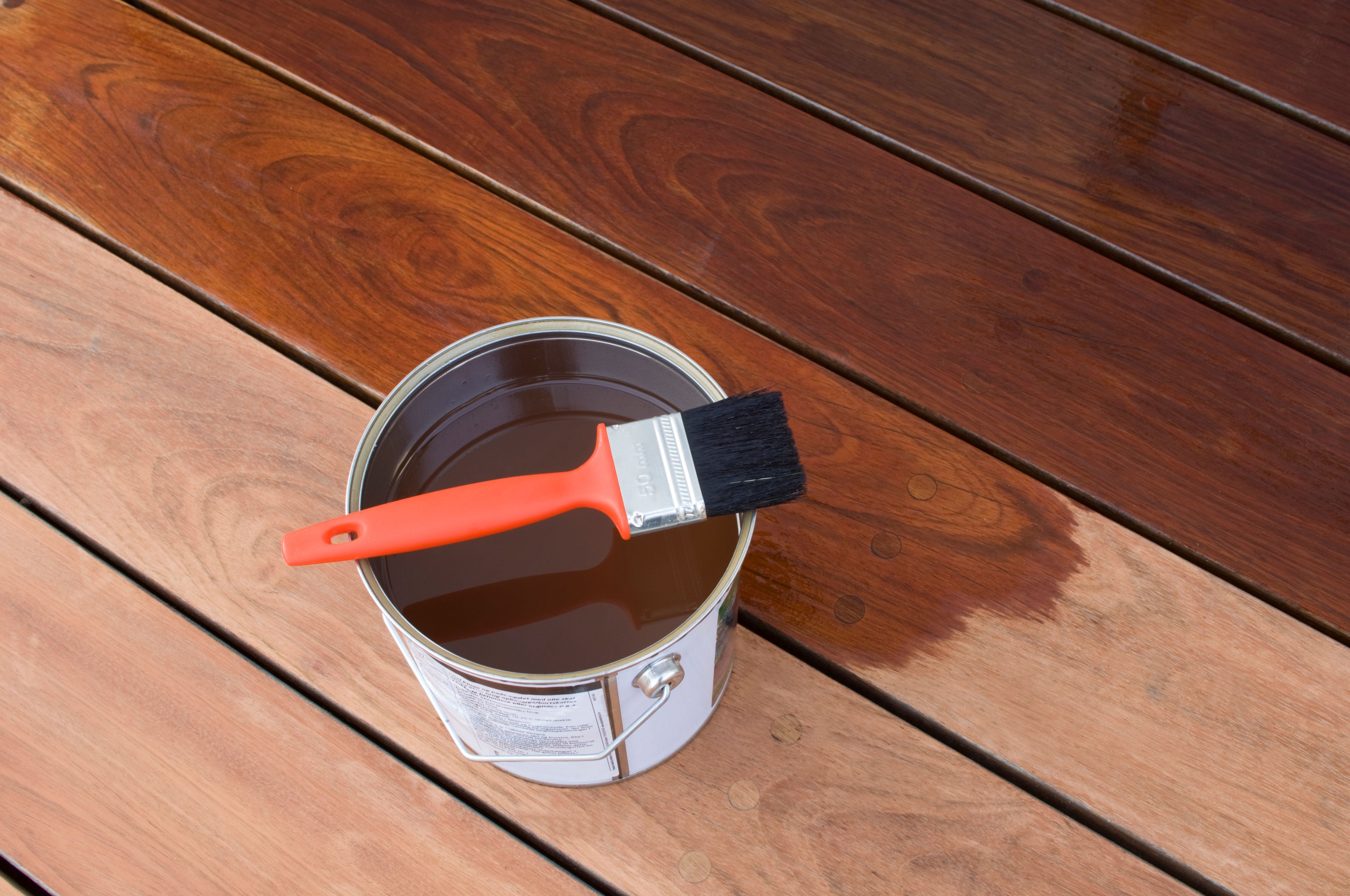 applying deck stain