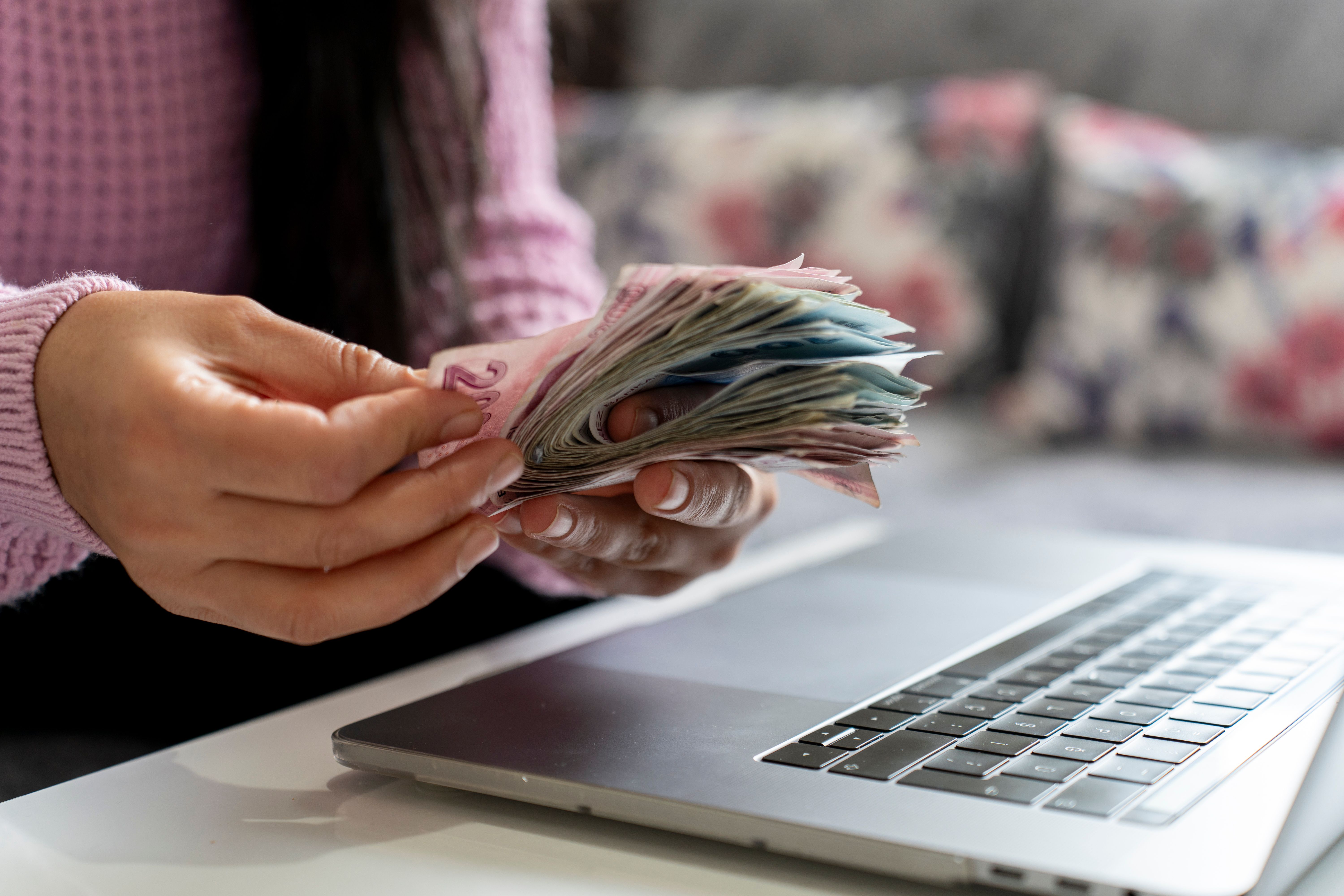 Businesswoman counting Turkish money.