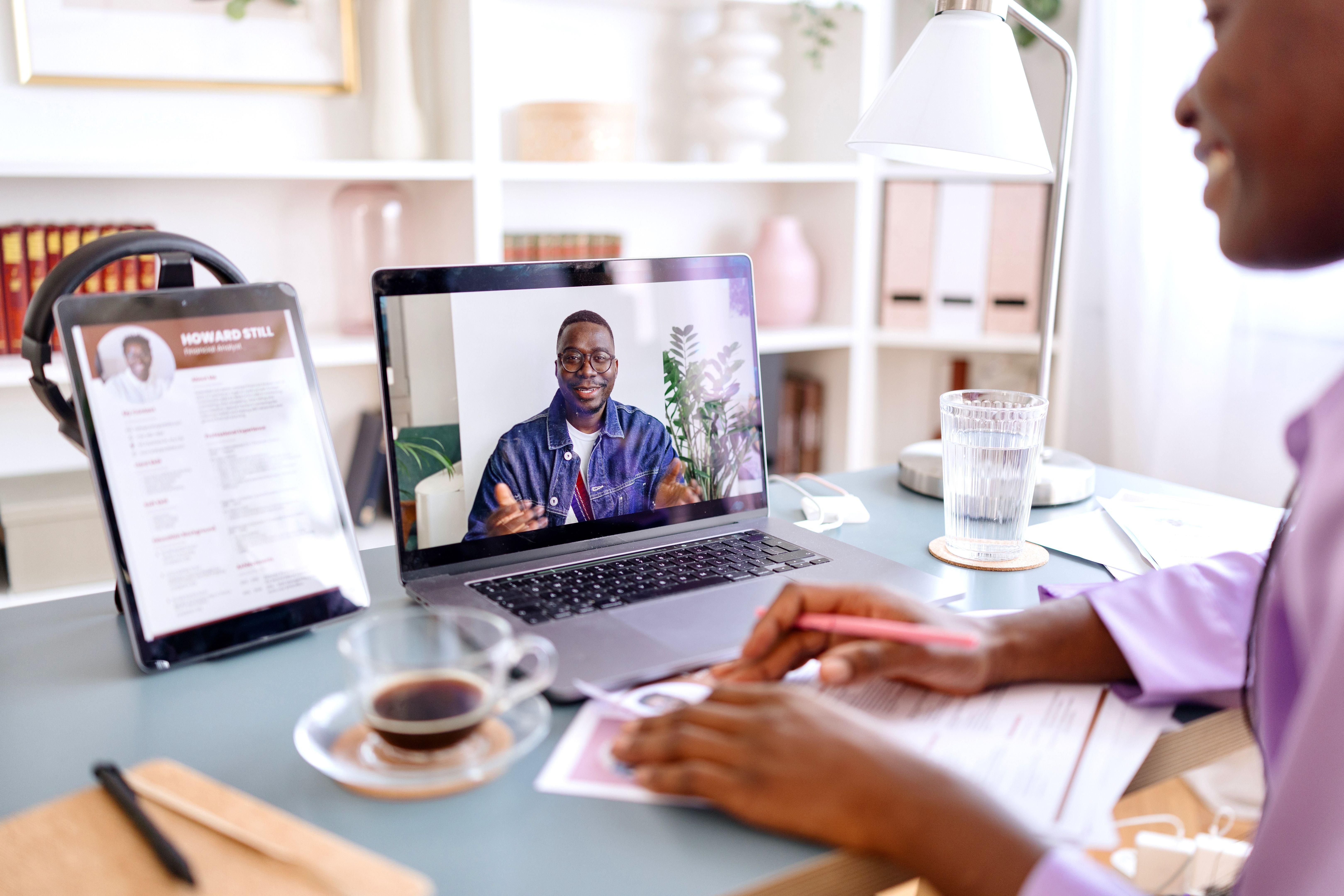 Smiling woman doing job interview with her client Smiling woman doing job interview with her client