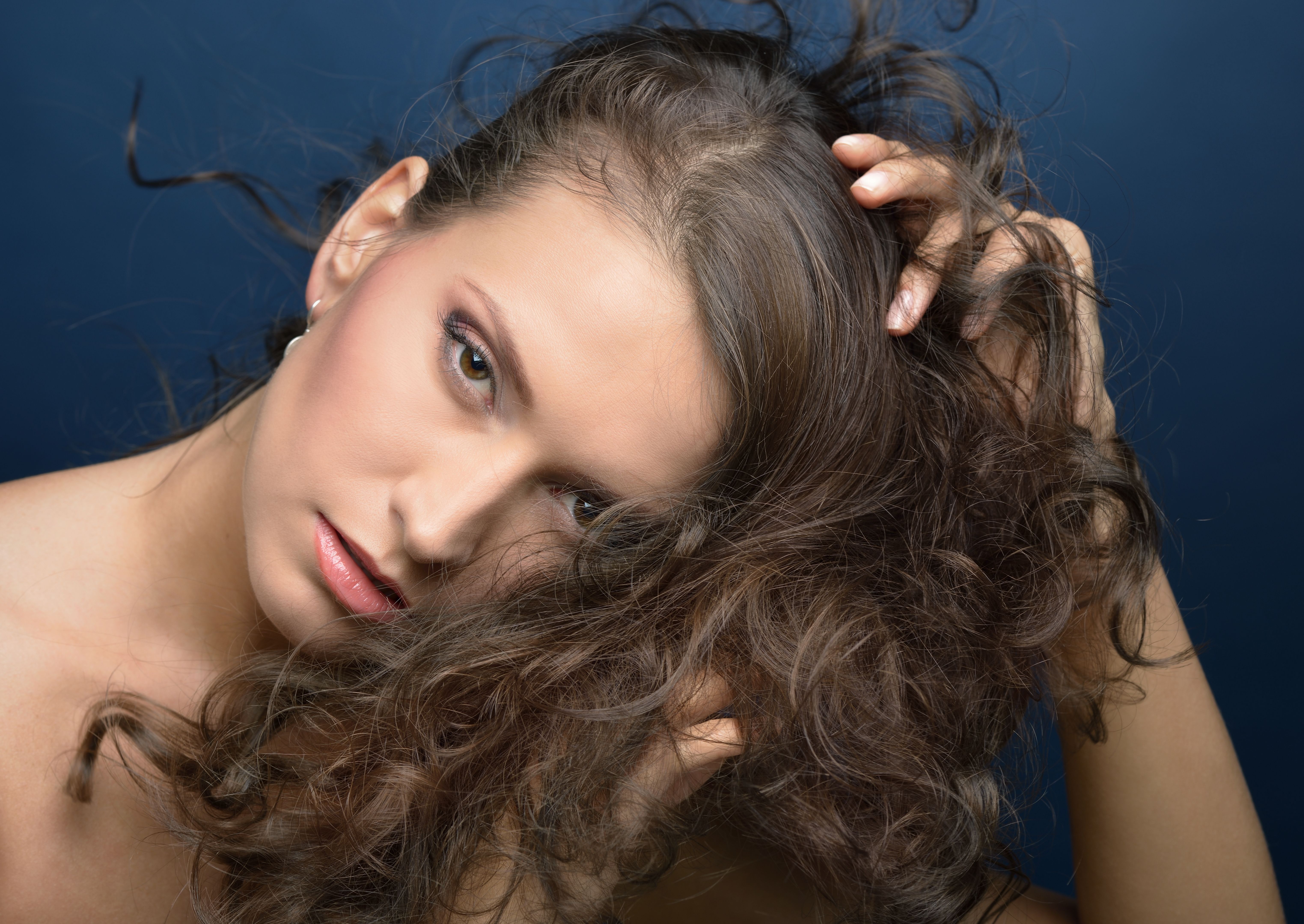 Portrait of the beautiful woman with long hair.