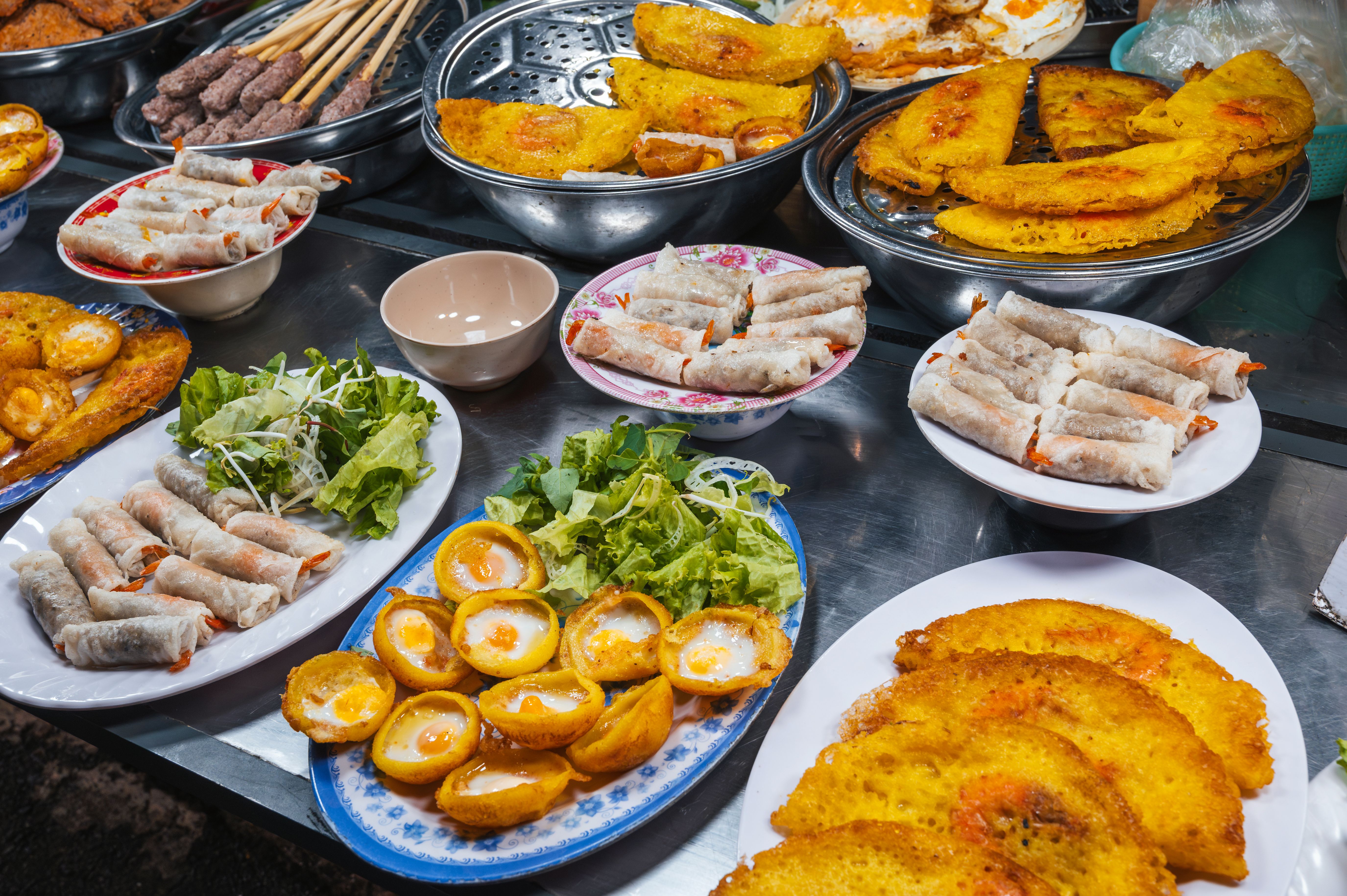 Vietnamese food at the Asian night market on street in Vietnam in Asia in Da Nang