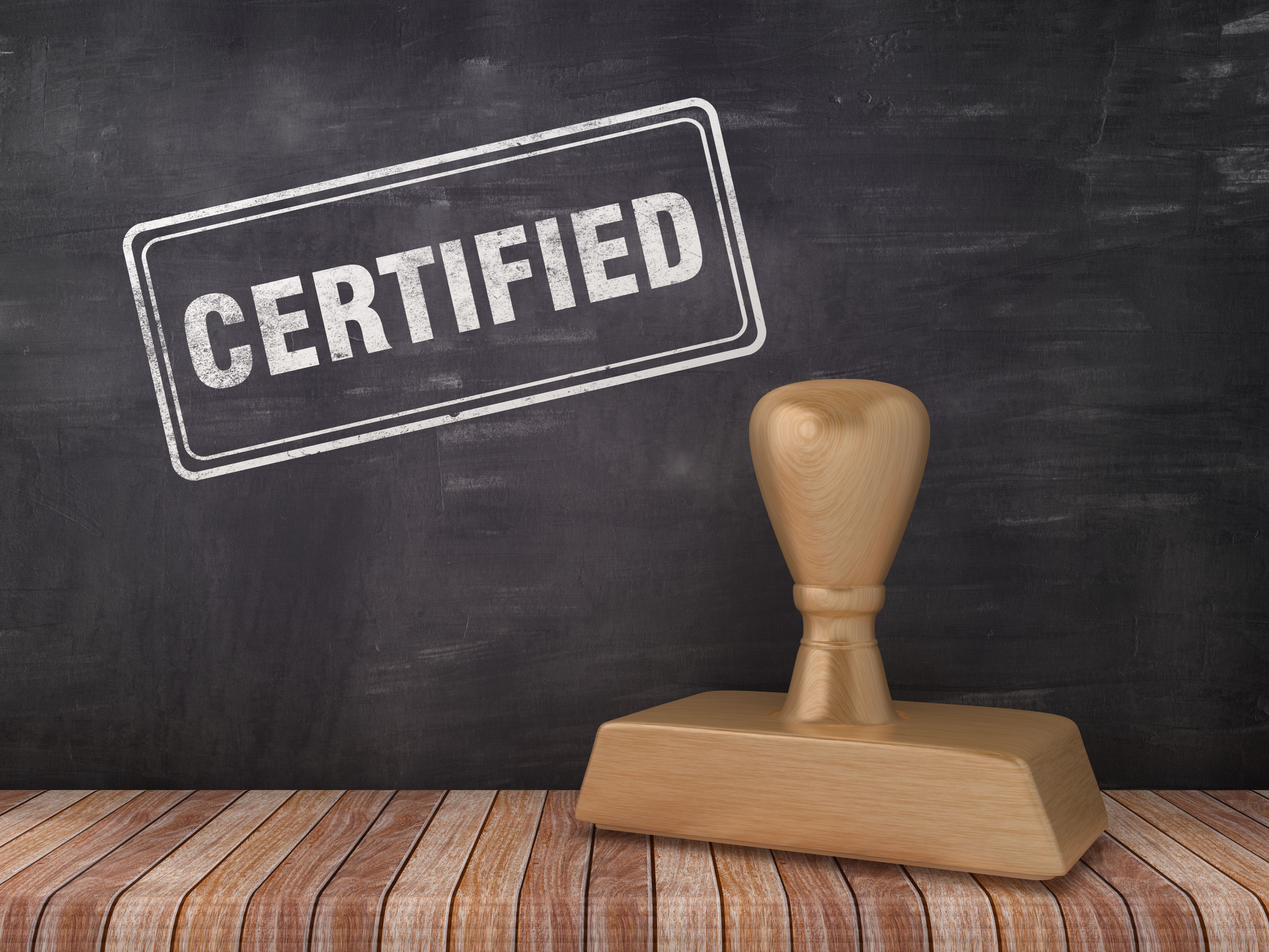 ZERTIFIZIERTe Stempel auf Tafel Hintergrund - 3D Rendering