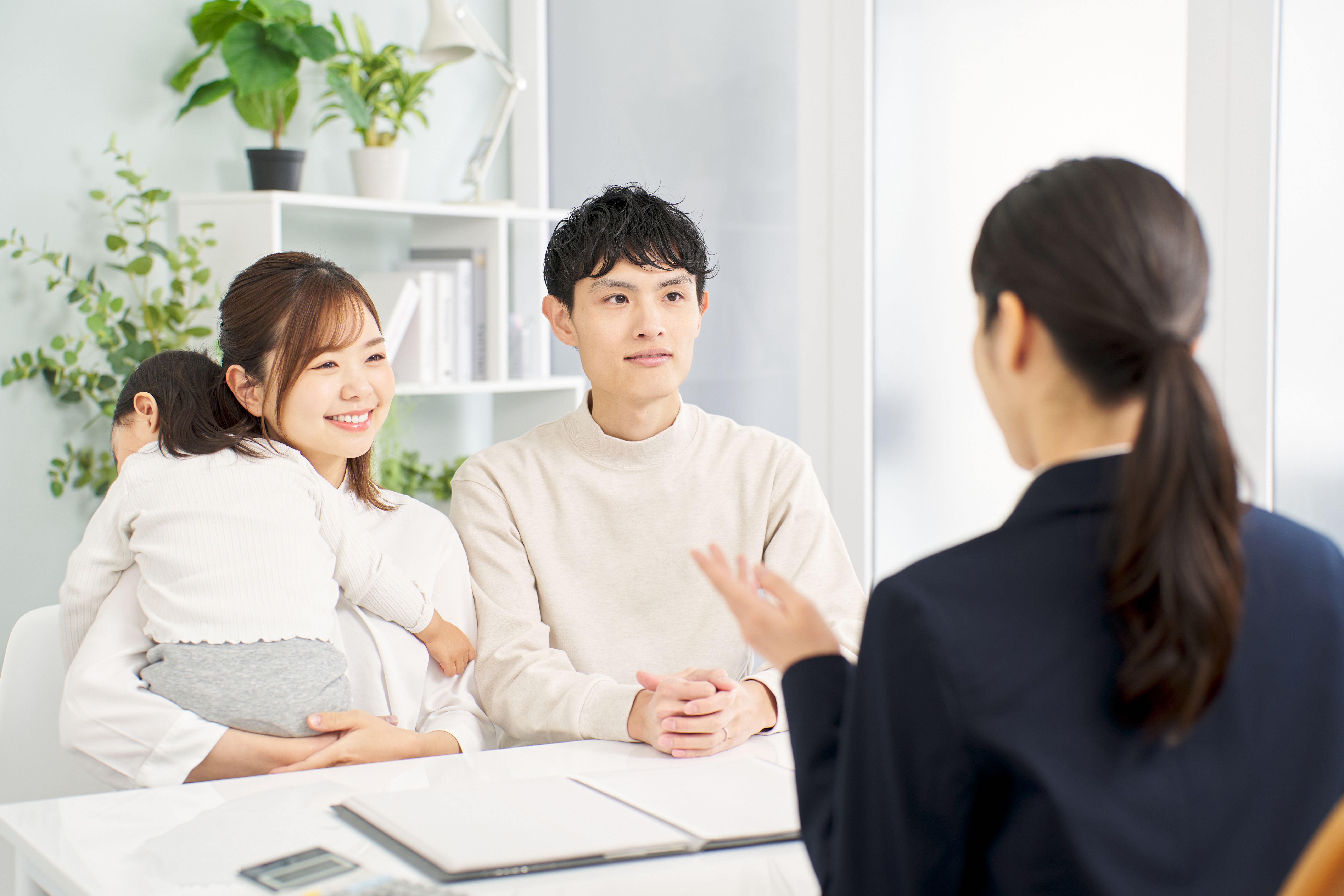 A family receiving information about insurance