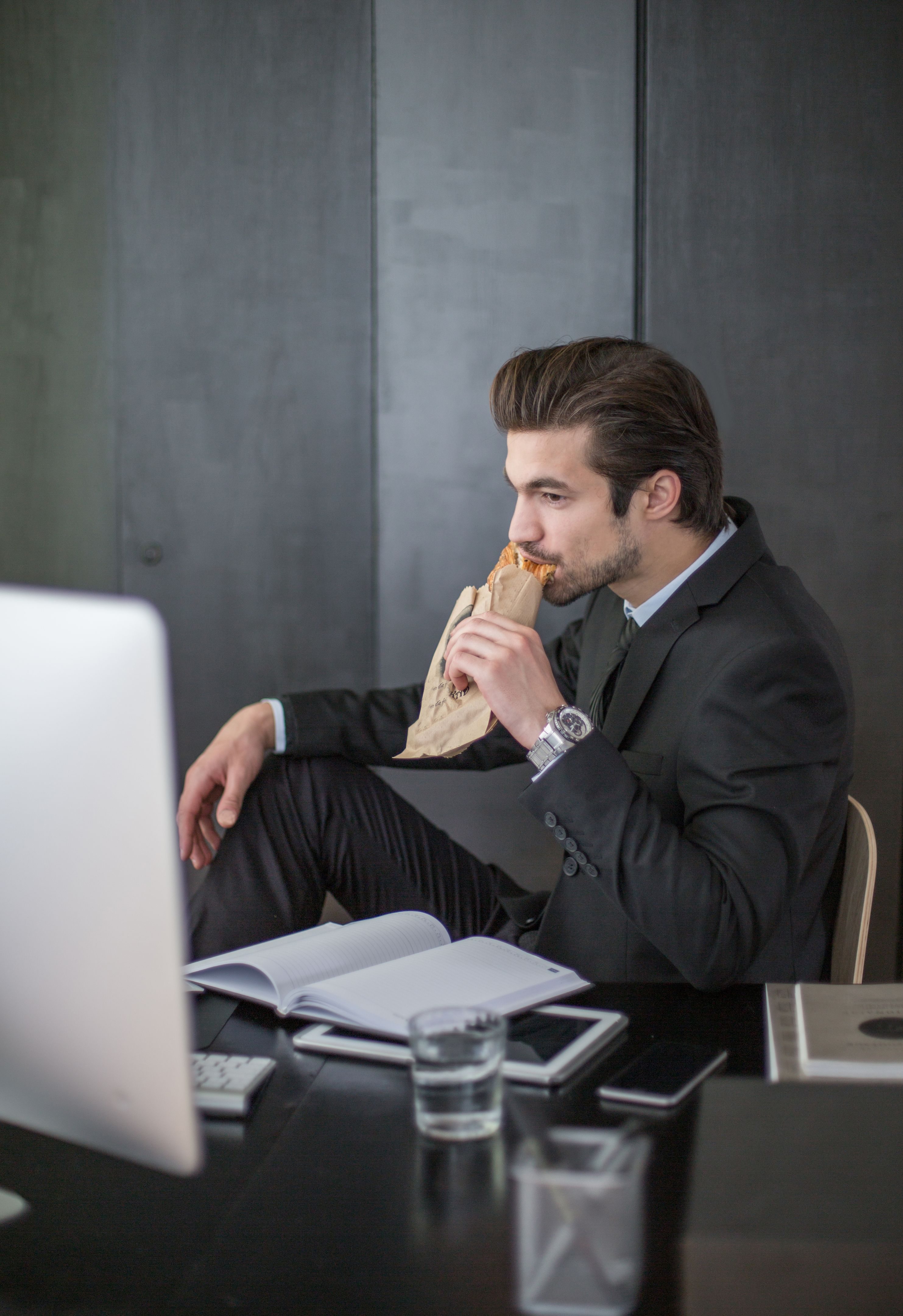 busy professional eating