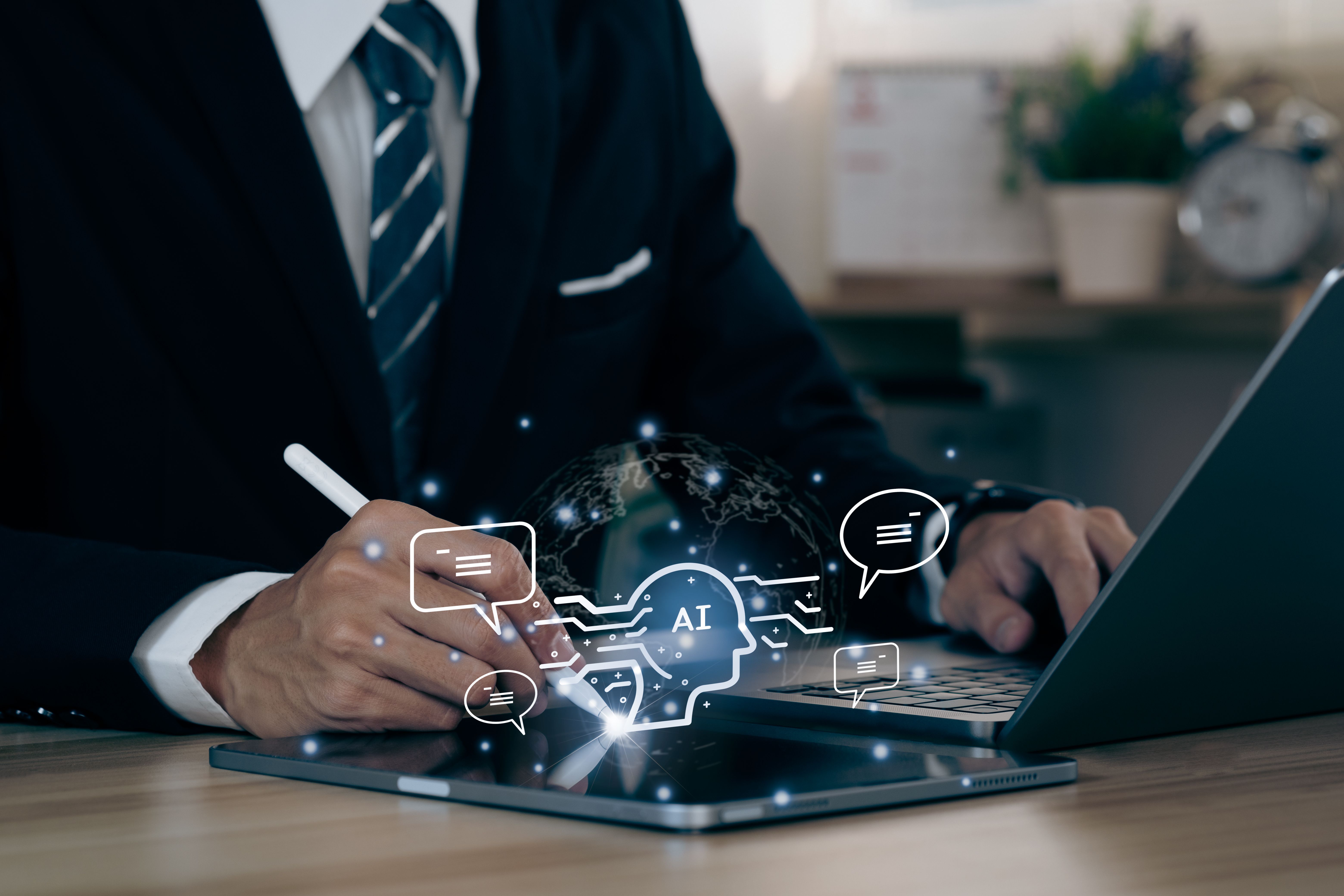 Businessman using computer chatting with an intelligent artificial intelligence asks for the answers wants. knowledge on the internet, e-learning, Robot application, conversation assistant Businessman using computer chatting with an intelligent artificial intelligence asks for the answers wants. knowledge on the internet, e-learning, Robot application, conversation assistant