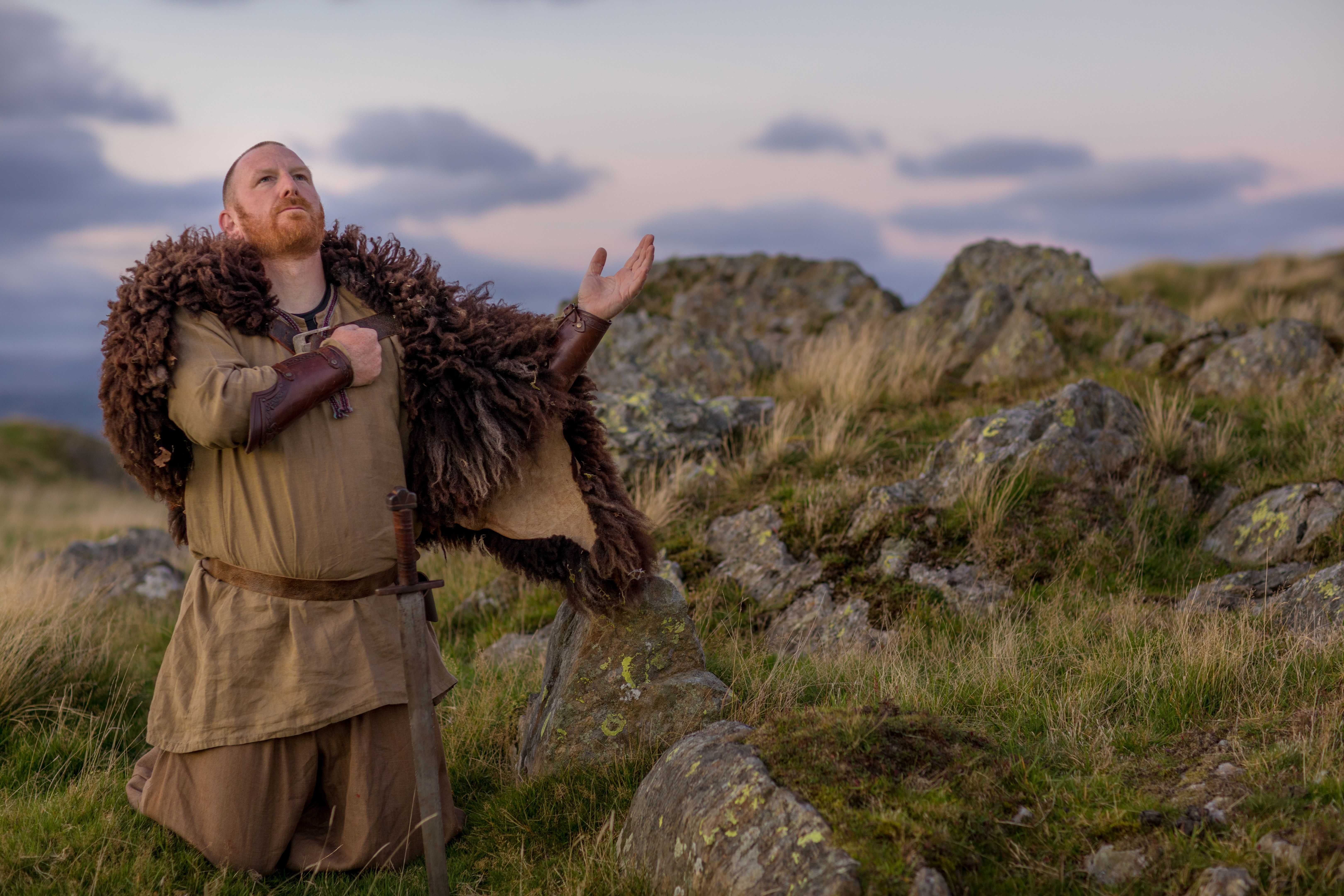 An individual Weapon wielding viking warrior in the British highlands