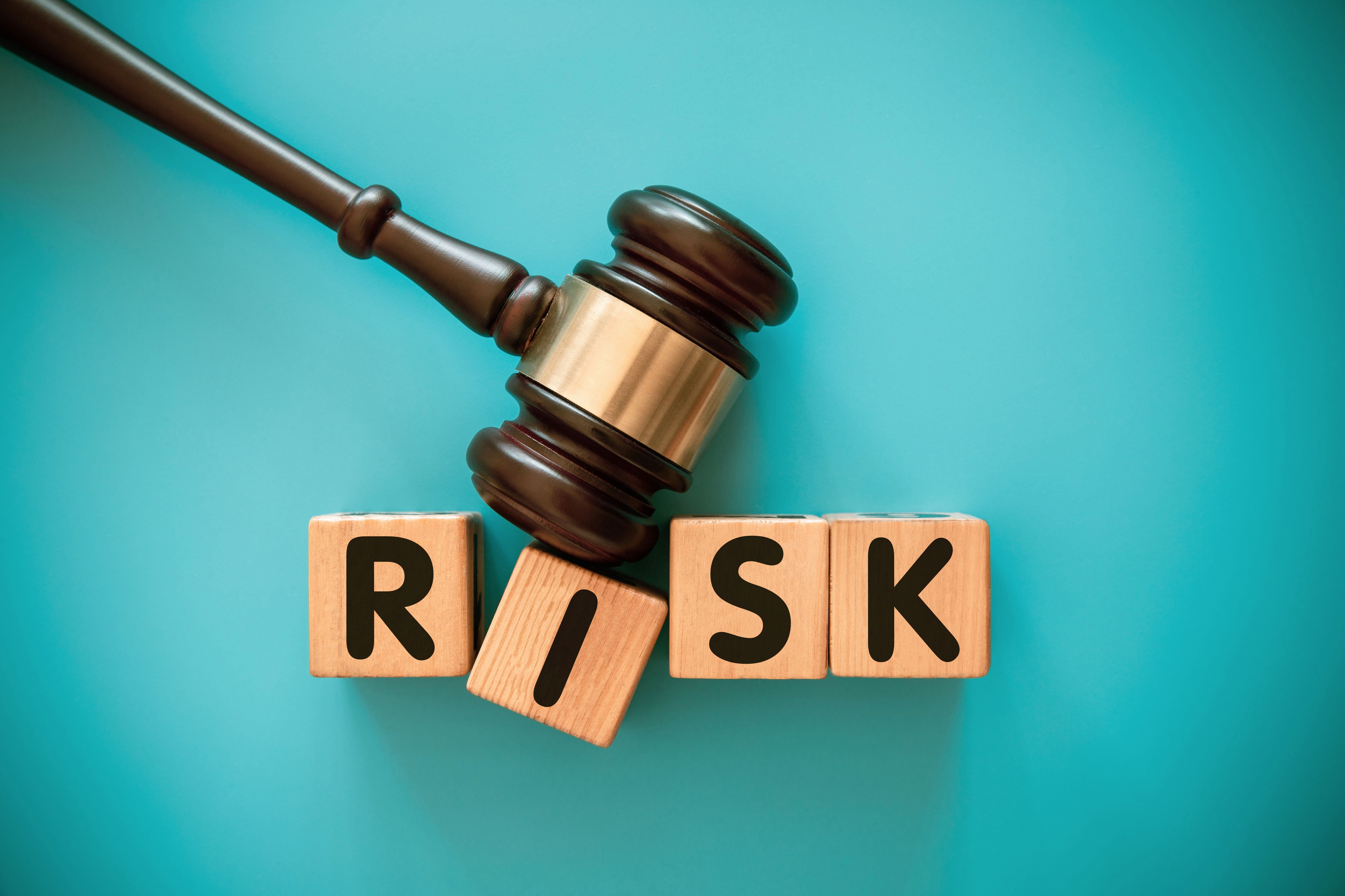 Gavel and wood block with RISK Gavel and wood block with RISK
