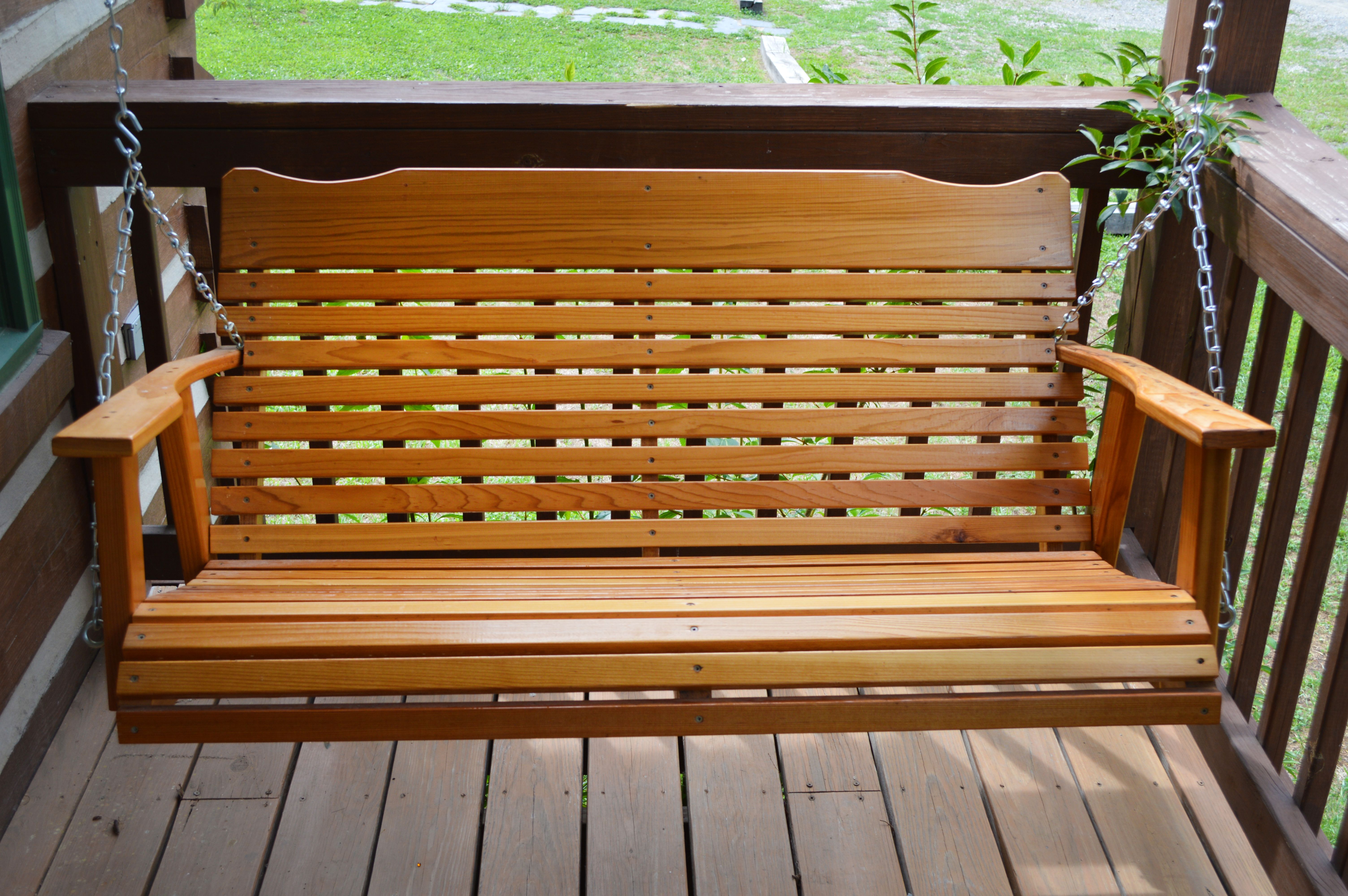 wooden porch swing
