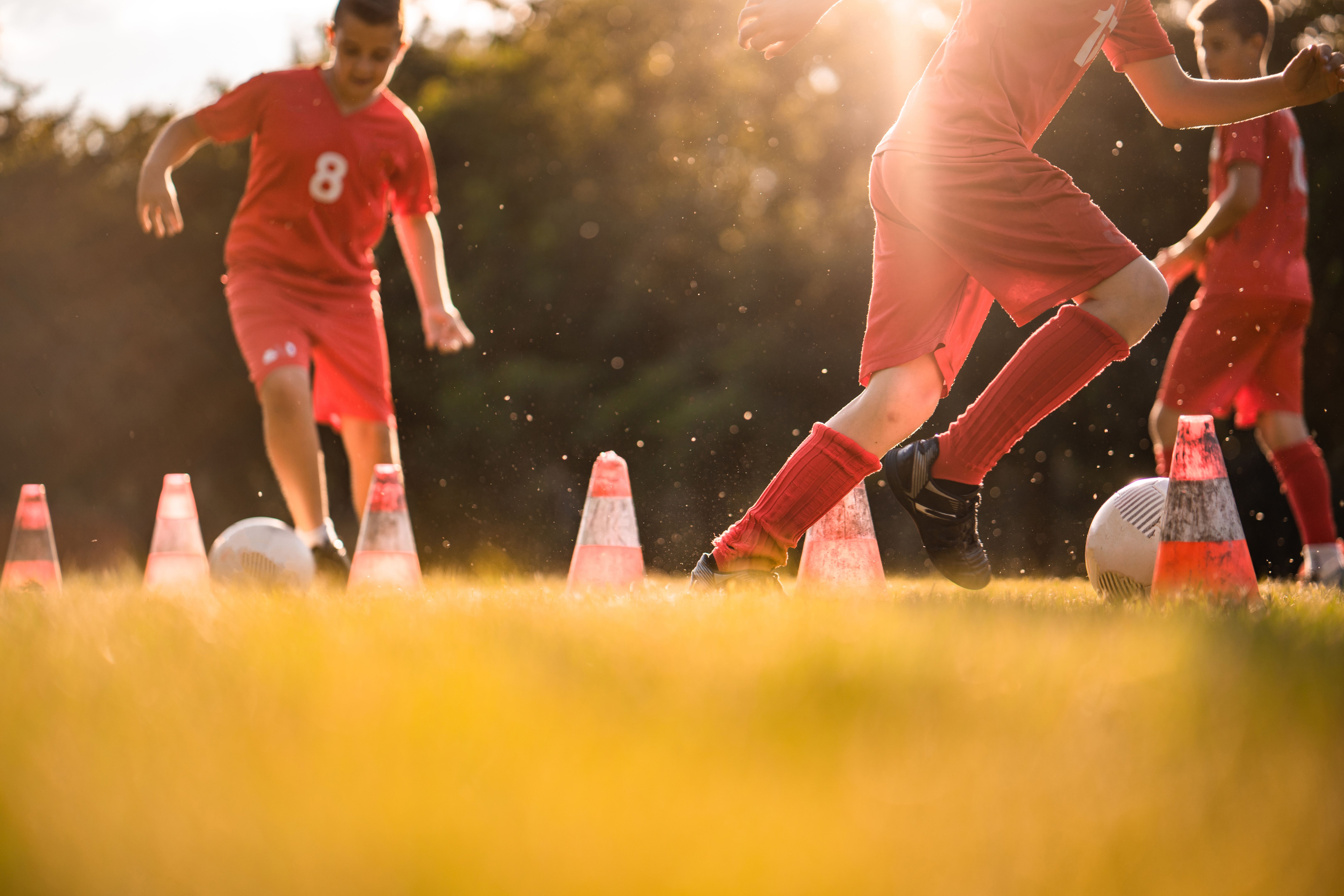 children playing soccer