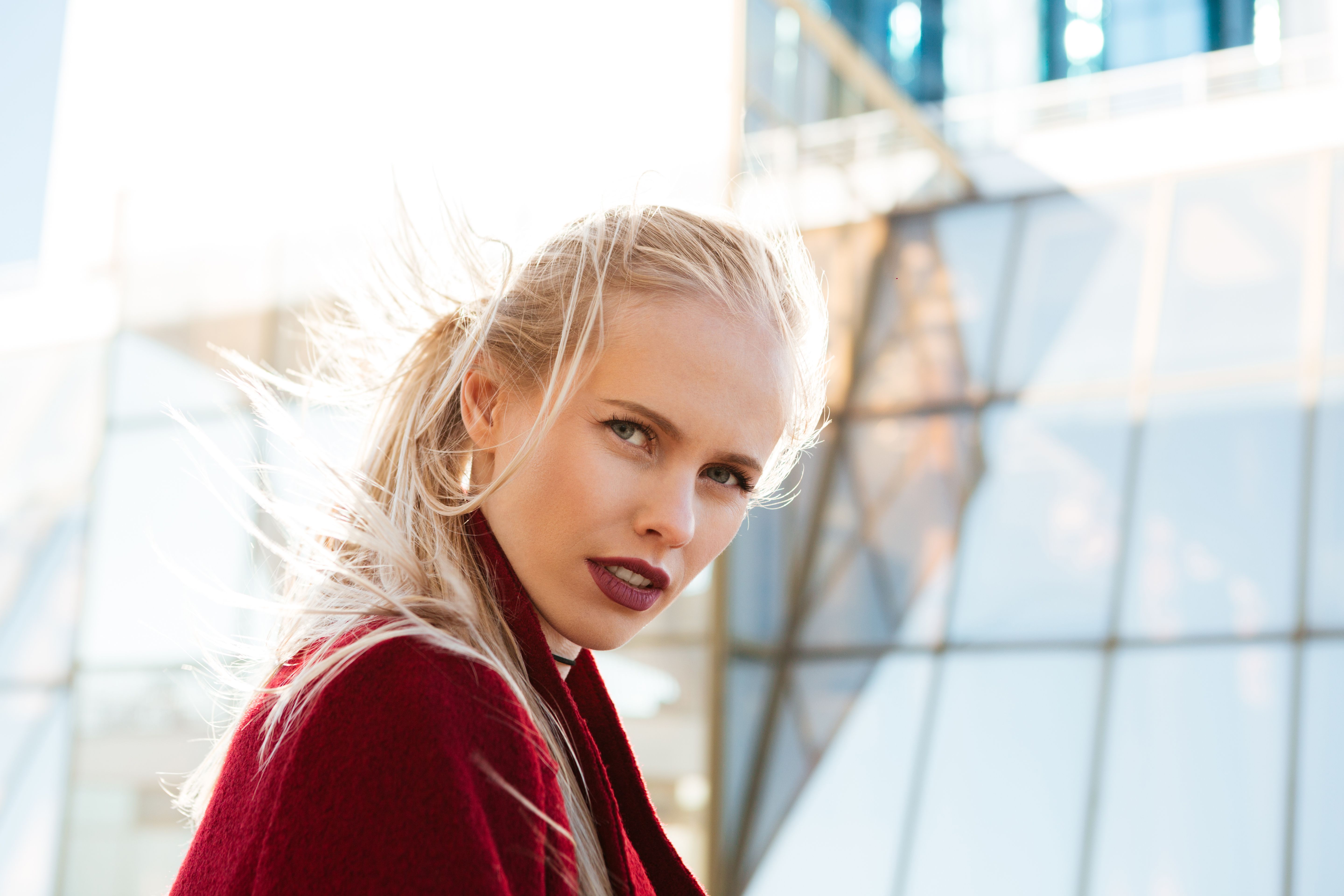Beautiful serious caucasian woman walking outdoors. Beautiful serious caucasian woman walking outdoors.