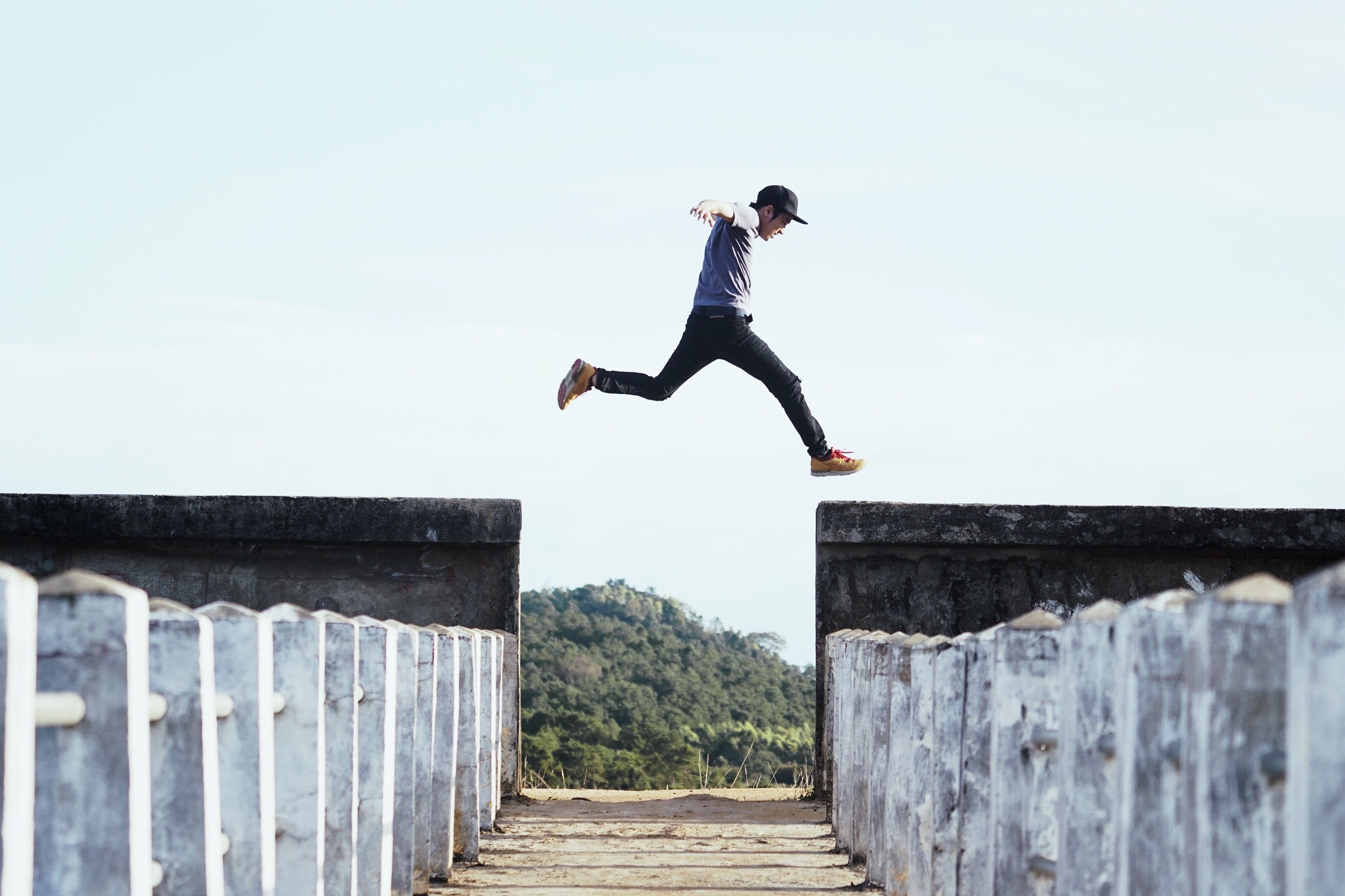 Full Length Of Man Jumping Against Sky