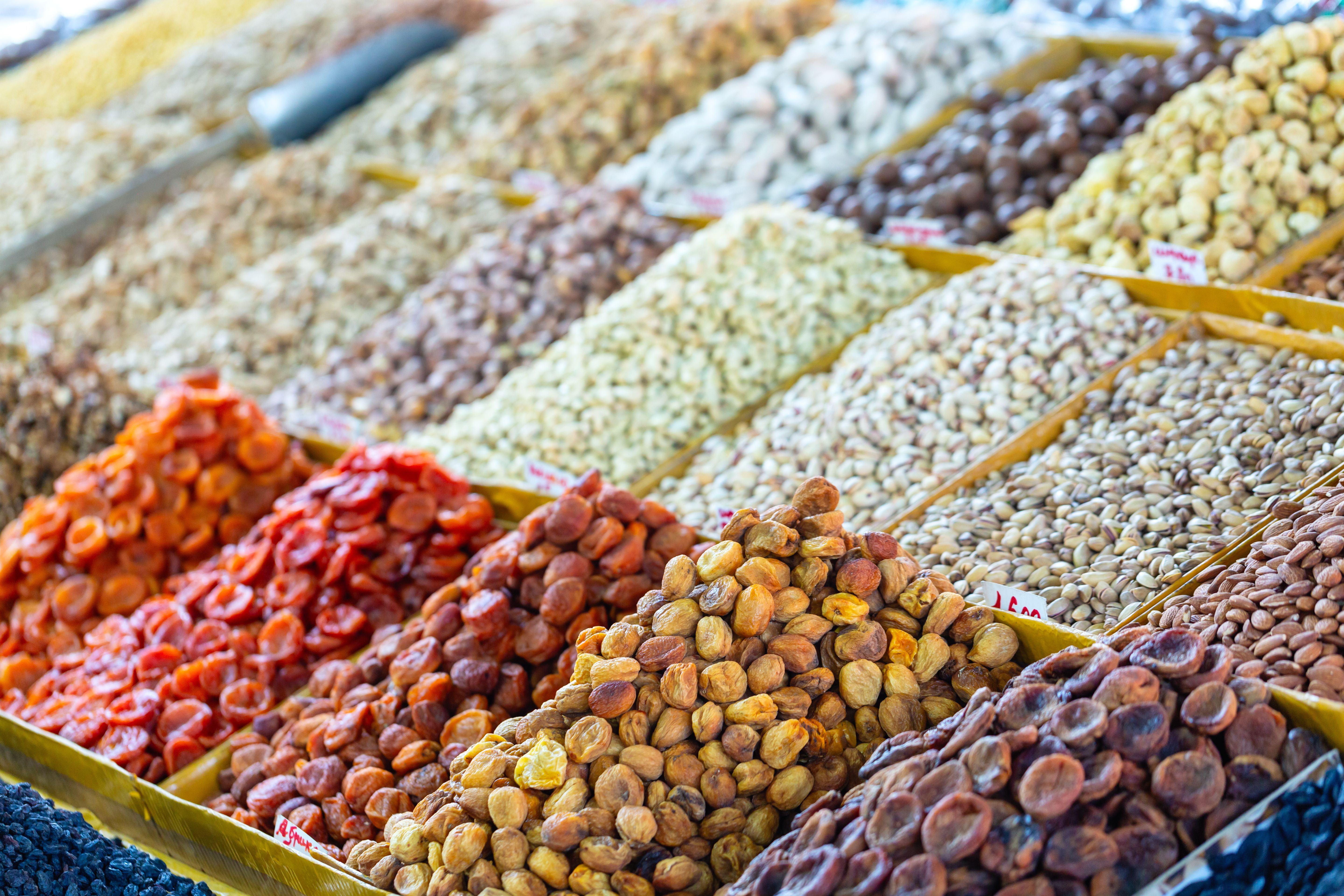 Dried fruits and nuts at the Osh Bazaar market in Bishkek, Kyrgyzstan, Central Asia