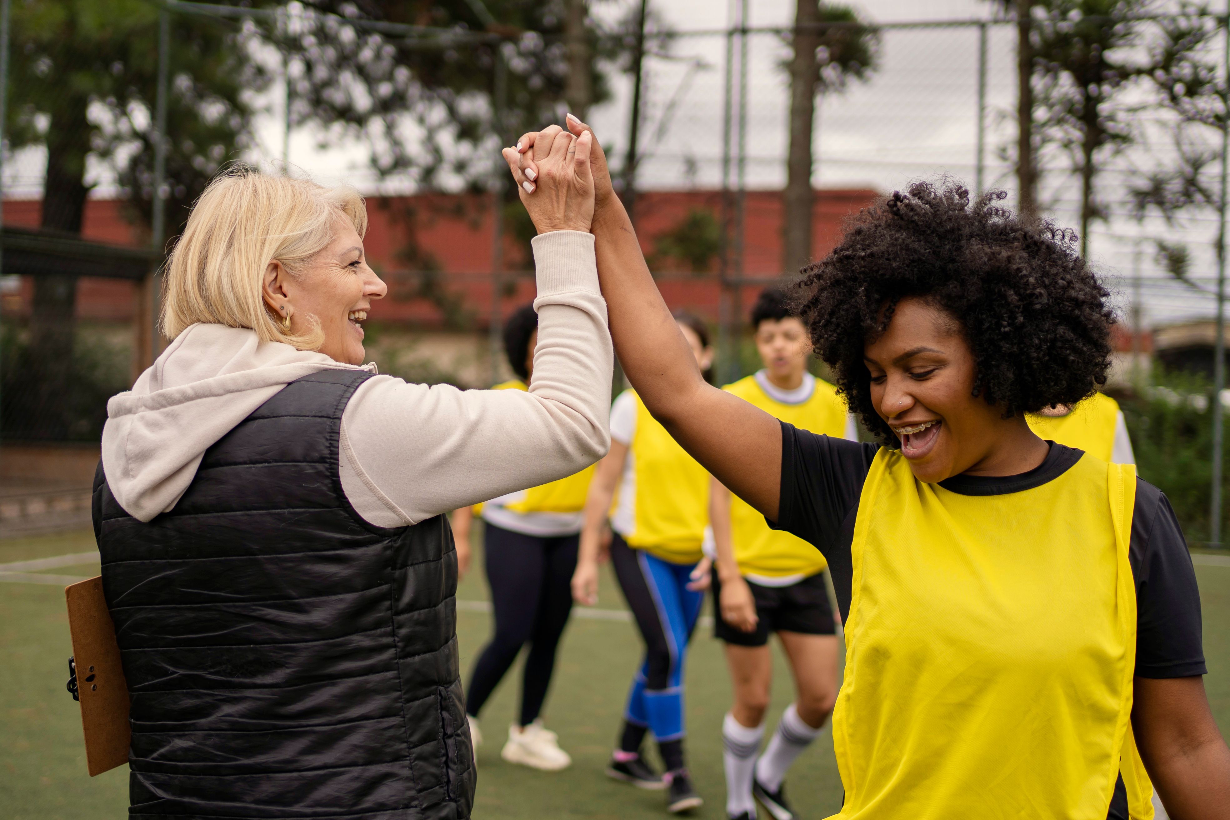 women soccer teamwork