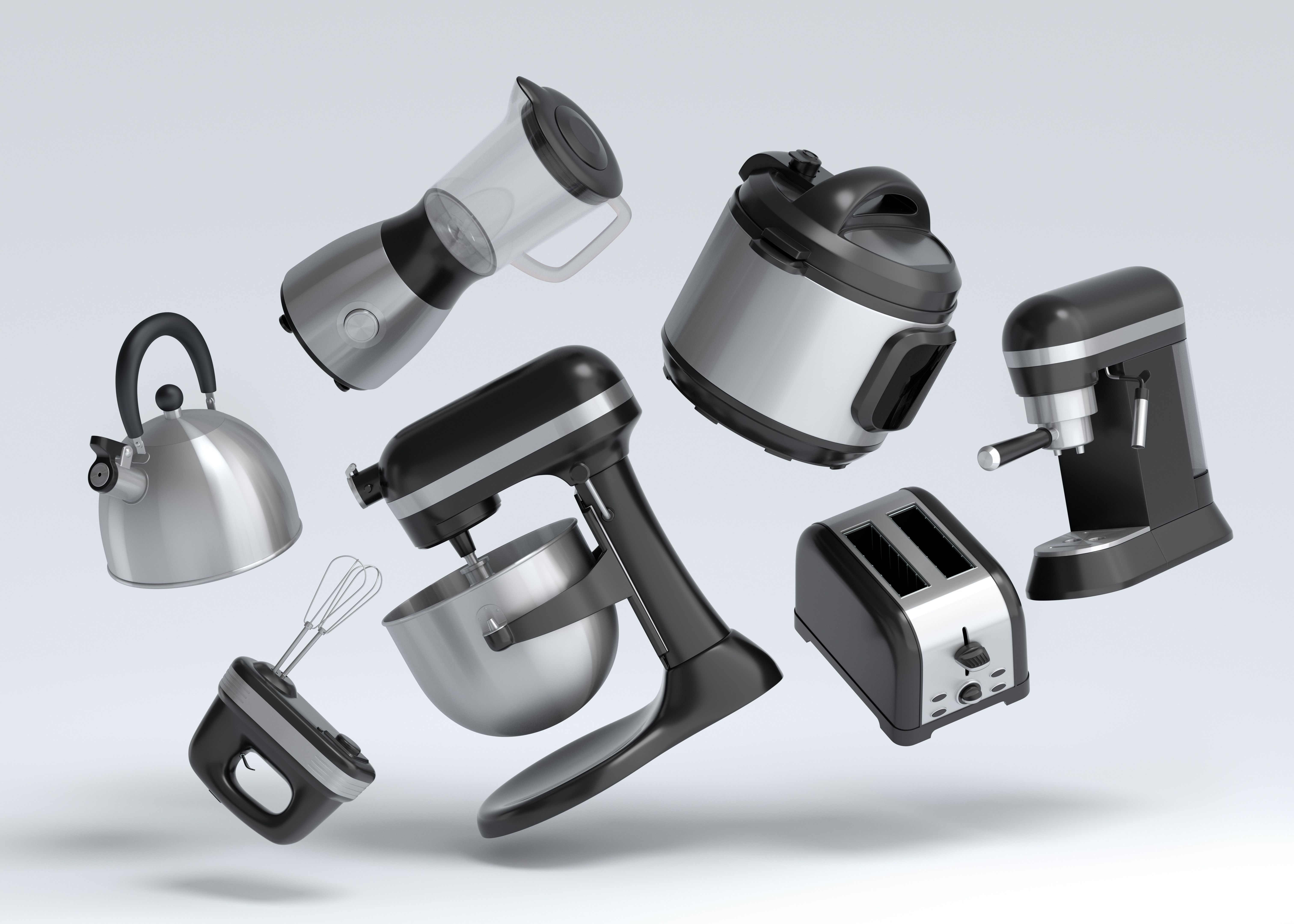 Electric kitchen appliances and utensils for making breakfast on white