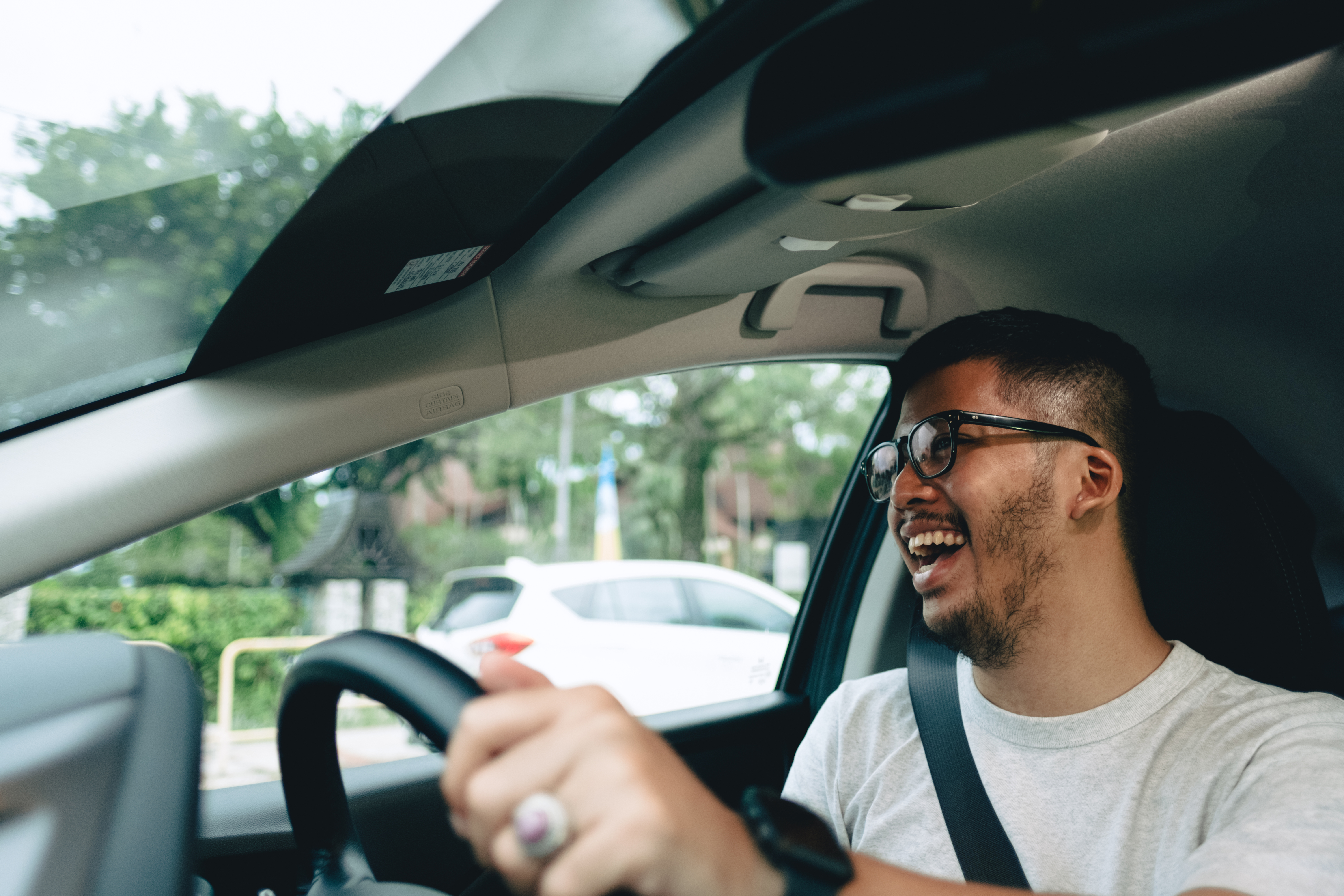 Portrait of Young Malaysian Man Behind The Wheel
