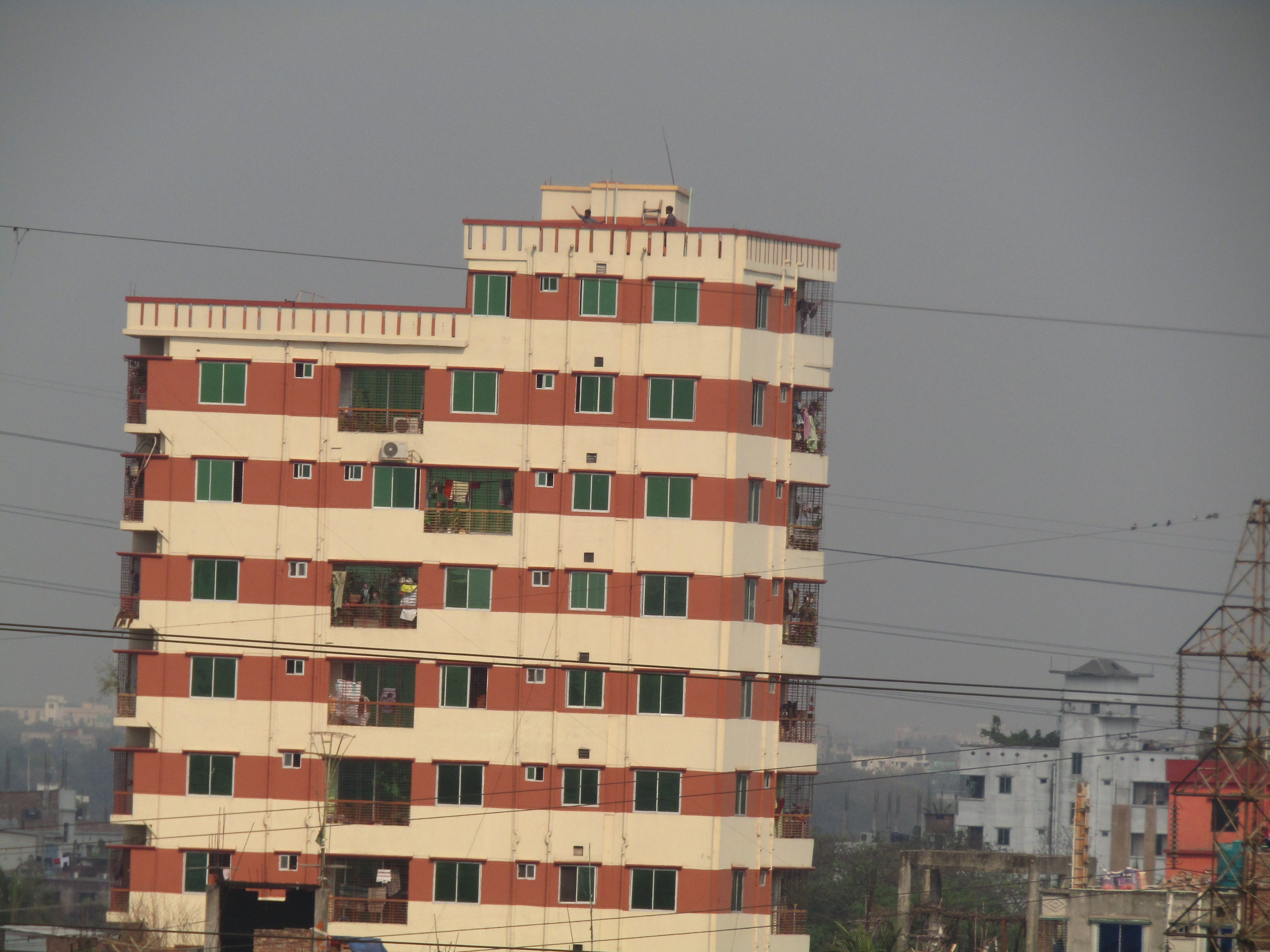 Close-Up of Old Building and House in Dhaka City, Bangladesh. Cloudy Sky on a Sunny Day Close-Up of Old Building and House in Dhaka City, Bangladesh. Cloudy Sky on a Sunny Day